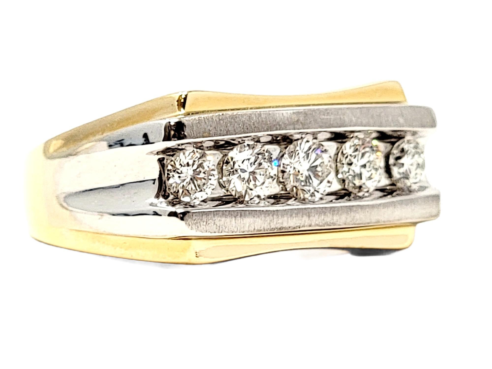 Ring size: 11

Sleek, handsome band ring embellished with sparkling round diamonds and a unique two tone gold finish. This masculine band ring features 5 bright white diamonds channel set in a single row at the center of a brushed 14 karat white