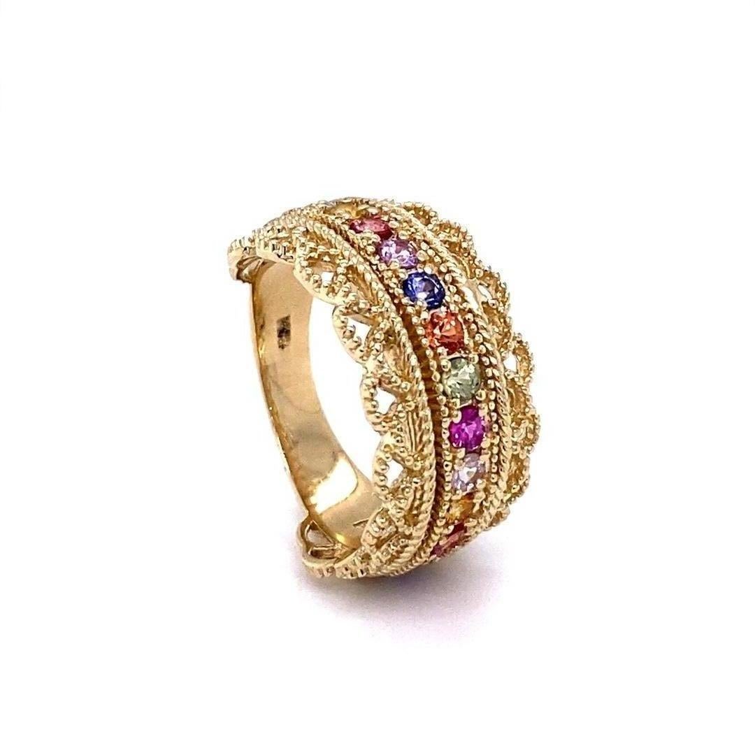 1.00 Carat Multi Color Sapphire Yellow Gold Cocktail Band

A Uniquely designed Multi Color Sapphire that is sure to be a great addition to your jewelry collection!  
This band has 15 Round Cut Multi-Colored Sapphires that weigh 1.00 carats.  It's