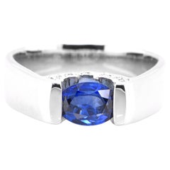 1.00 Carat Natural Blue Sapphire and Diamond Tension-Set Ring Made in Platinum