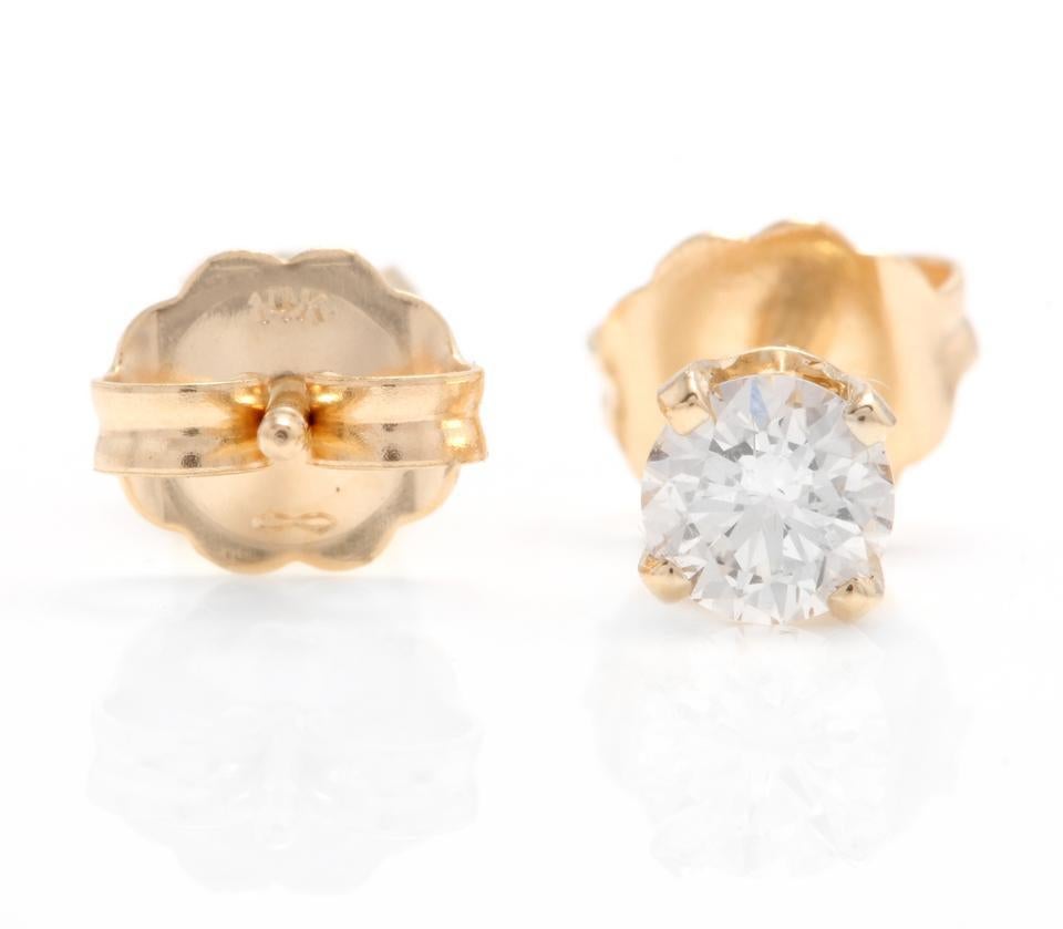 Exquisite 1.00 Carats Natural  Diamond 14K Solid Yellow Gold Stud Earrings

Amazing looking piece! 

Suggested Replacement Value: $3,800.00

Total Natural Round Cut Diamonds Weight: 1.00 Carats (both earrings) VS2-SI1 / I

Diamond Measures: