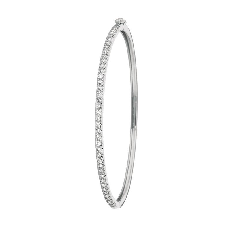 1.00 Carat Natural Diamond Bangle Bracelet G SI 14K White Gold

100% Natural Diamonds, Not Enhanced in any way Round Cut Diamond Bangle
1.00CT
G-H
SI
14K White Gold, Prong Style, 7.10 grams
7 inches in length--1/10 inch in width
40