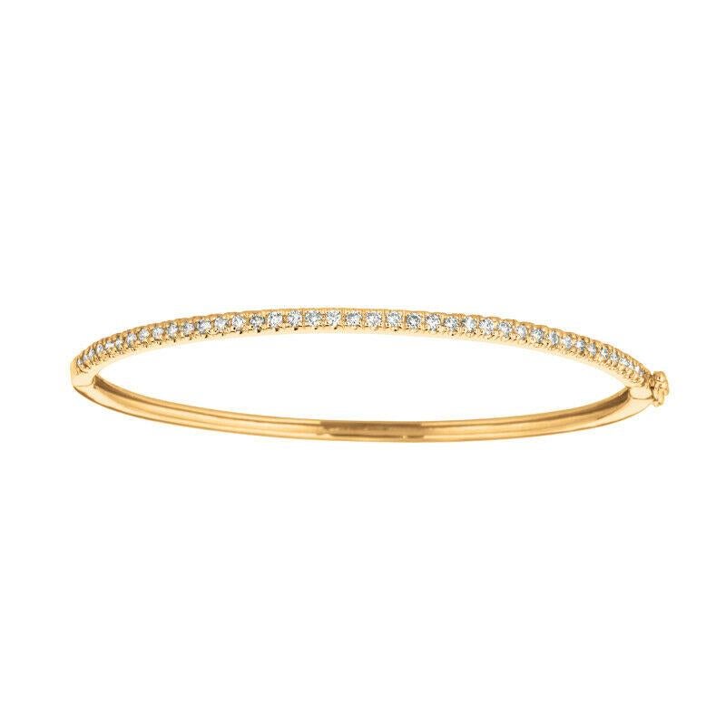 1.00 Carat Natural Diamond Bangle Bracelet G SI 14K Yellow Gold

100% Natural Diamonds, Not Enhanced in any way Round Cut Diamond Bangle  
1.00CT
G-H 
SI  
14K Yellow Gold,  Prong Style,   7.10 grams
7 inches in length--1/10 inch in width
40 stones