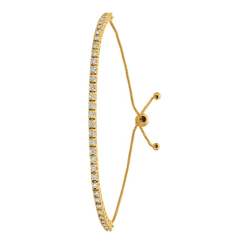 1.00 Carat Natural Diamond Bolo Bracelet G SI 14K Yellow Gold 7''

100% Natural Diamonds, Not Enhanced in any way Round Cut Diamond Bracelet
1.00CT
G-H
SI
14K Yellow Gold, Pave Style 4.3 gram
7-8 inches adjustable length, 1/10 inch in width
27