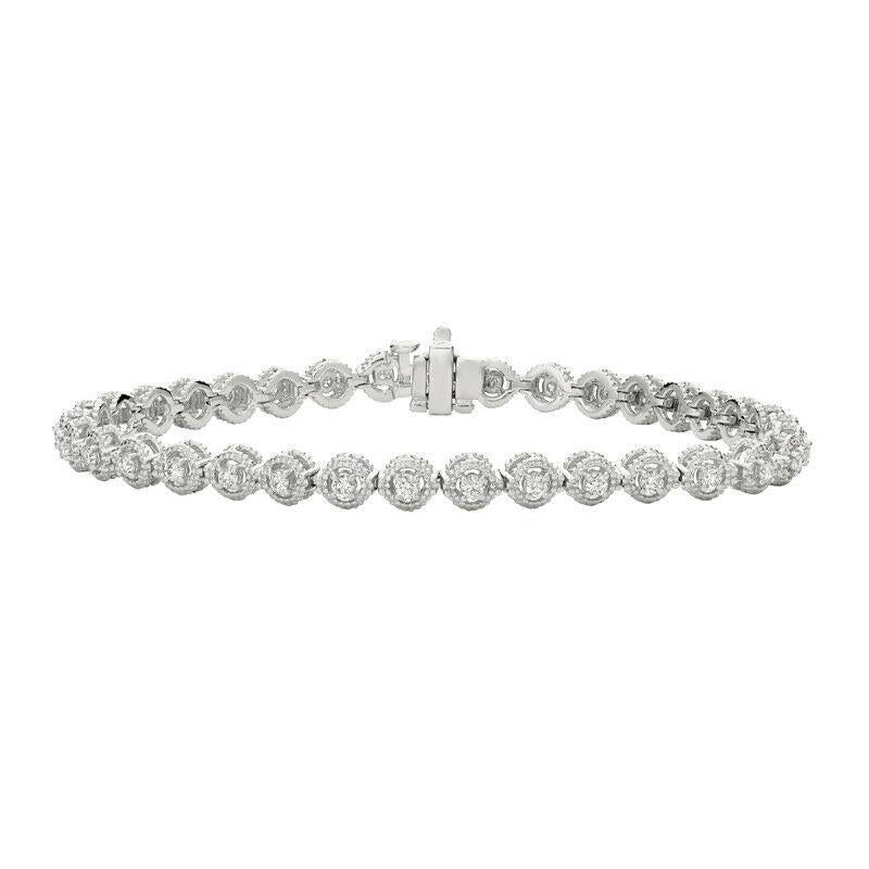 1.00 Carat Natural Diamond Bracelet G SI 14K White Gold

100% Natural Diamonds, Not Enhanced in any way Round Cut Diamond Bracelet 
1.00CT
G-H 
SI  
14K White Gold,  Pave Style,   10.2 grams
7 inches in length, 3/16 inch in width
35 diamonds 

