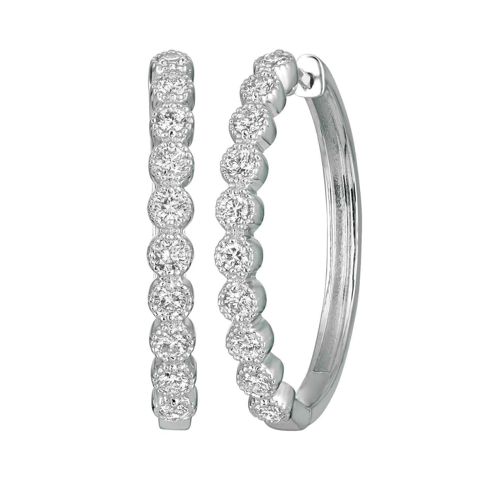 1.00 Carat Natural Diamond Oval Hoop Earrings G SI 14K Yellow Gold

100% Natural, Not Enhanced in any way Round Cut Diamond Earrings
1.00CT
G-H 
SI  
14K Yellow Gold  6.2 grams, burnish style 
1 1/8 inches in length, 1/8 inches in width
20