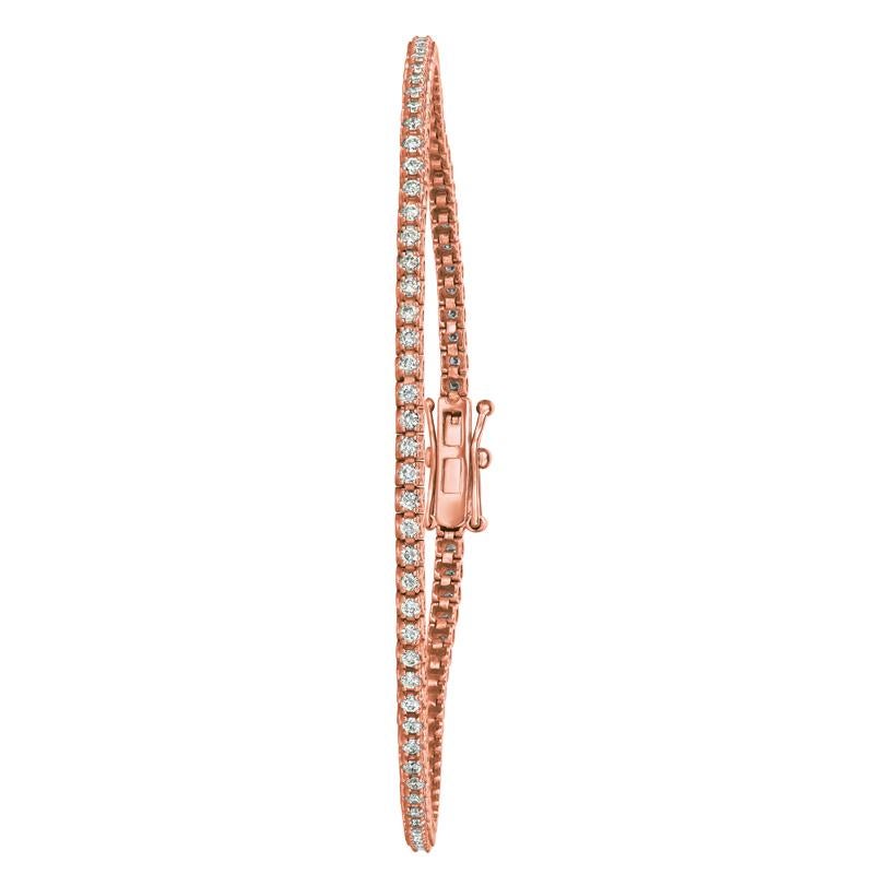 1.00 Carat Natural Diamond Tennis Bracelet G SI 14K Rose Gold 7''

100% Natural Diamonds, Not Enhanced in any way Round Cut Diamond Tennis Bracelet
1.00CT
G-H
SI
14K Rose Gold, prong style 4.6 grams
7 inches in length
2 mm in width
92 diamonds
Item