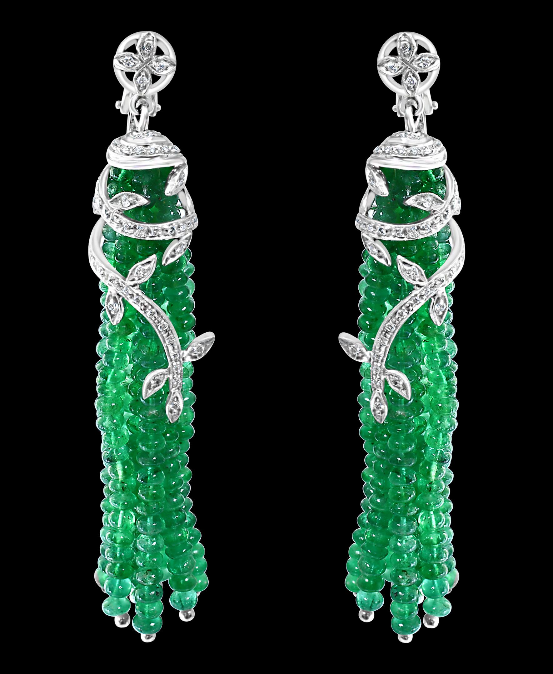 Approximately 100 Carat Natural  Emerald Beads & Diamond Hanging Earrings 18 Karat White Gold 
This exquisite pair of earrings are beautifully crafted with 18 karat White gold  
100 Carats of  fine emerald beads are  hanging  from a beautiful cap