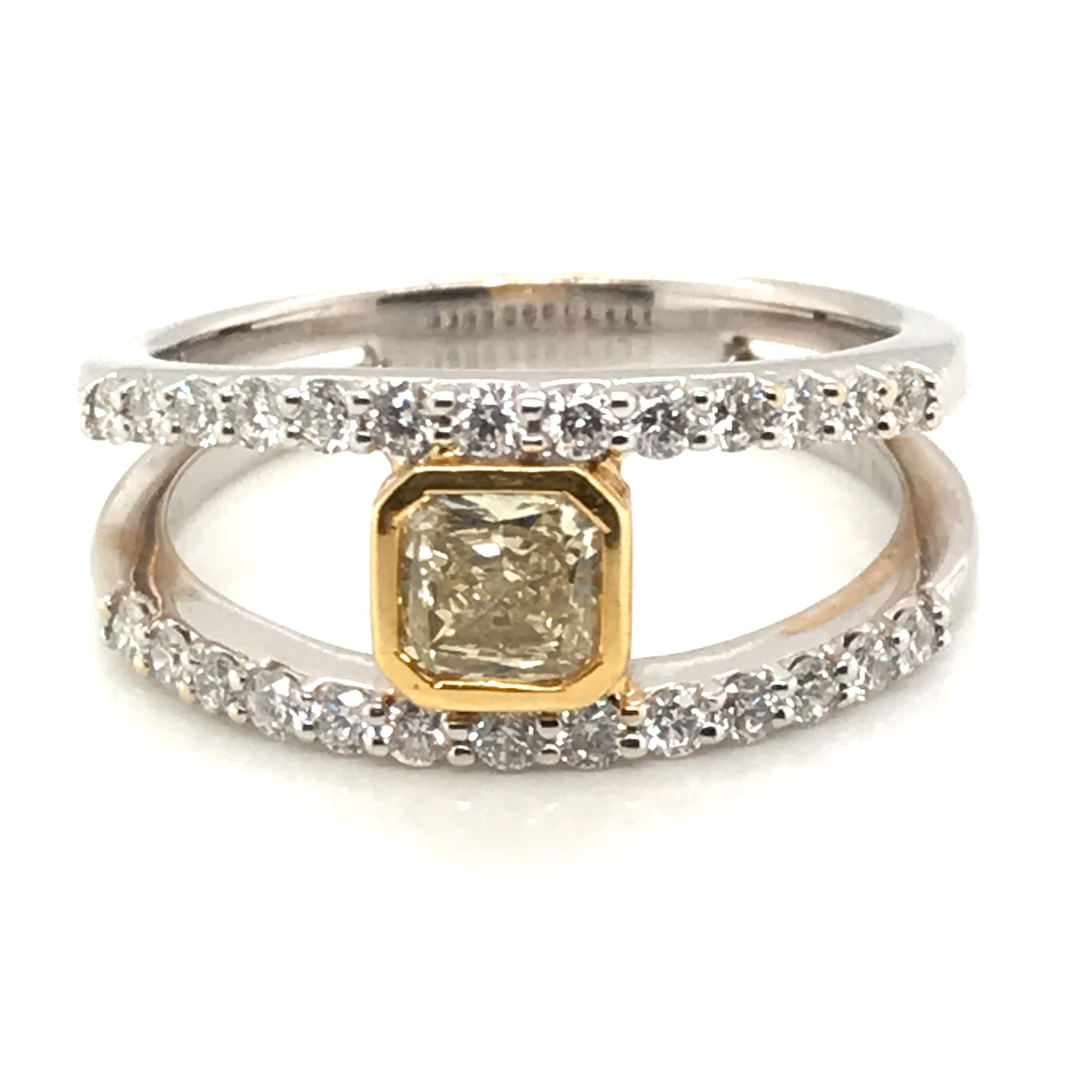 HJN Inc. Ring featuring a 1.00 Carat Natural Fancy Yellow Diamond Ring with 18K White and Yellow Gold

Natural Fancy Yellow Diamond: 0.50 Carats
Round-Cut Diamond Weight: 0.50 Carats

Total Stones: 27
Clarity Grade: SI1
Color Grade: H
Total Diamond