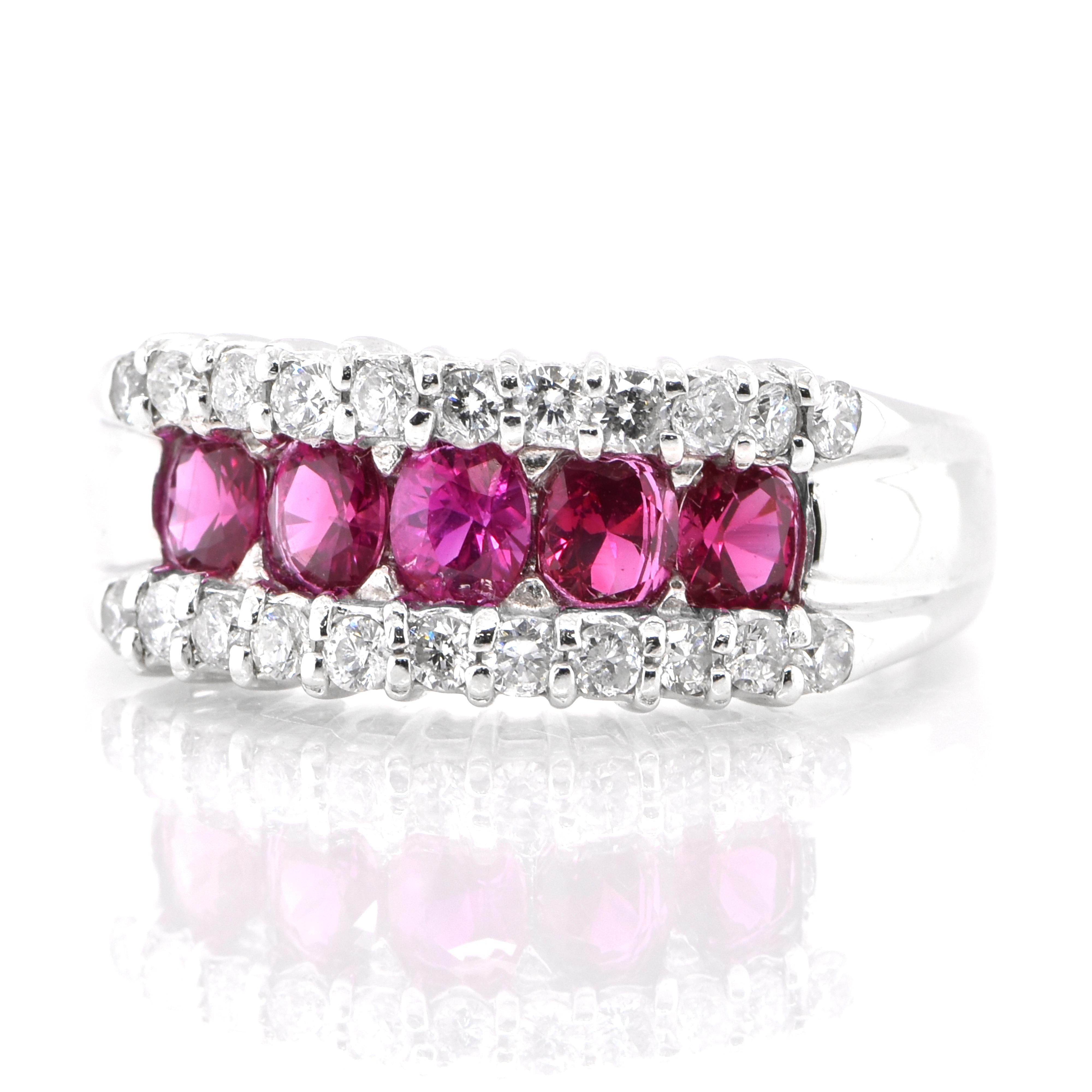 A beautiful band ring set in Platinum featuring 1.00 Carats Natural Rubies and 0.45 Carat Diamonds. Rubies are referred to as 