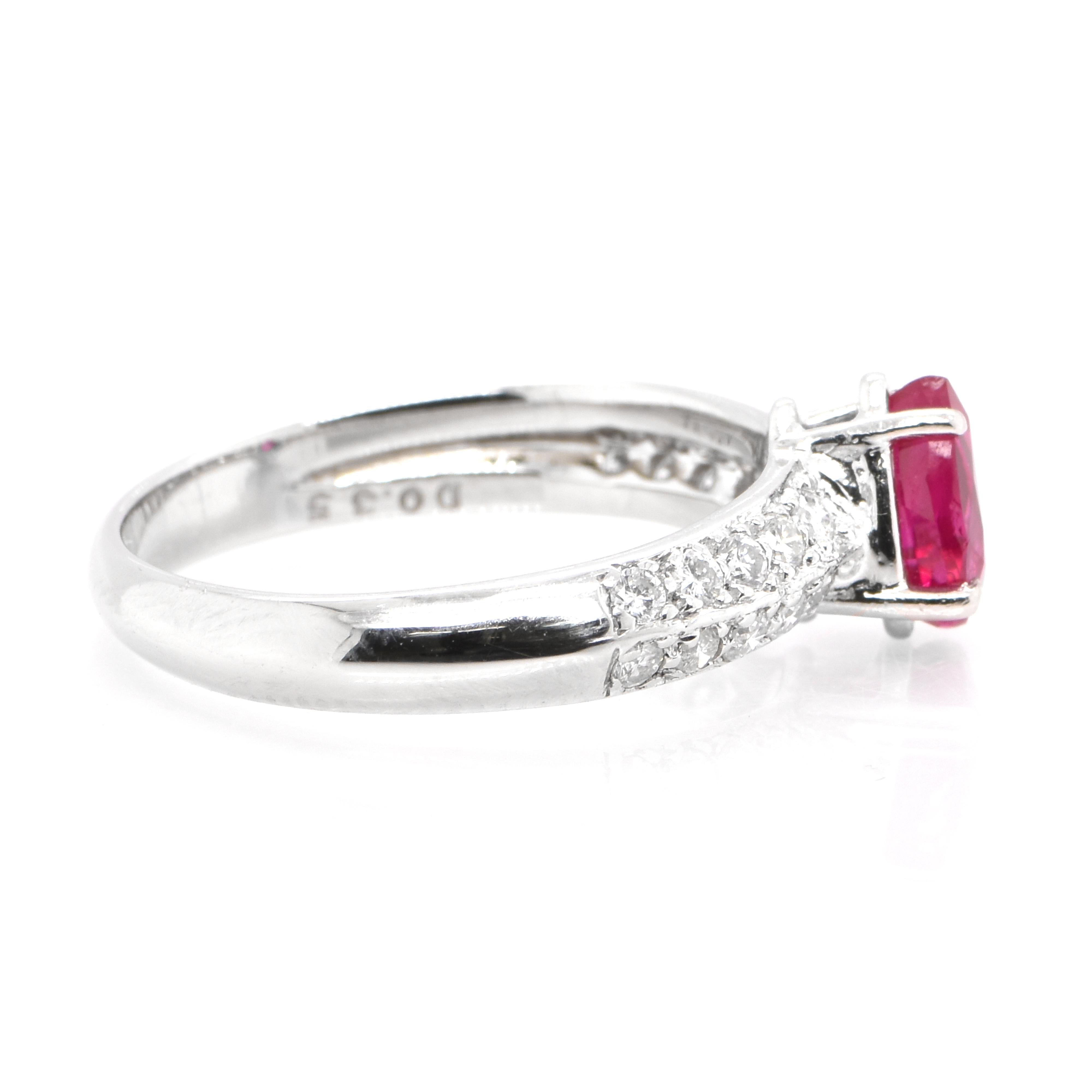 Women's 1.00 Carat Natural Pear Cut Ruby and Diamond Ring Set in Platinum For Sale