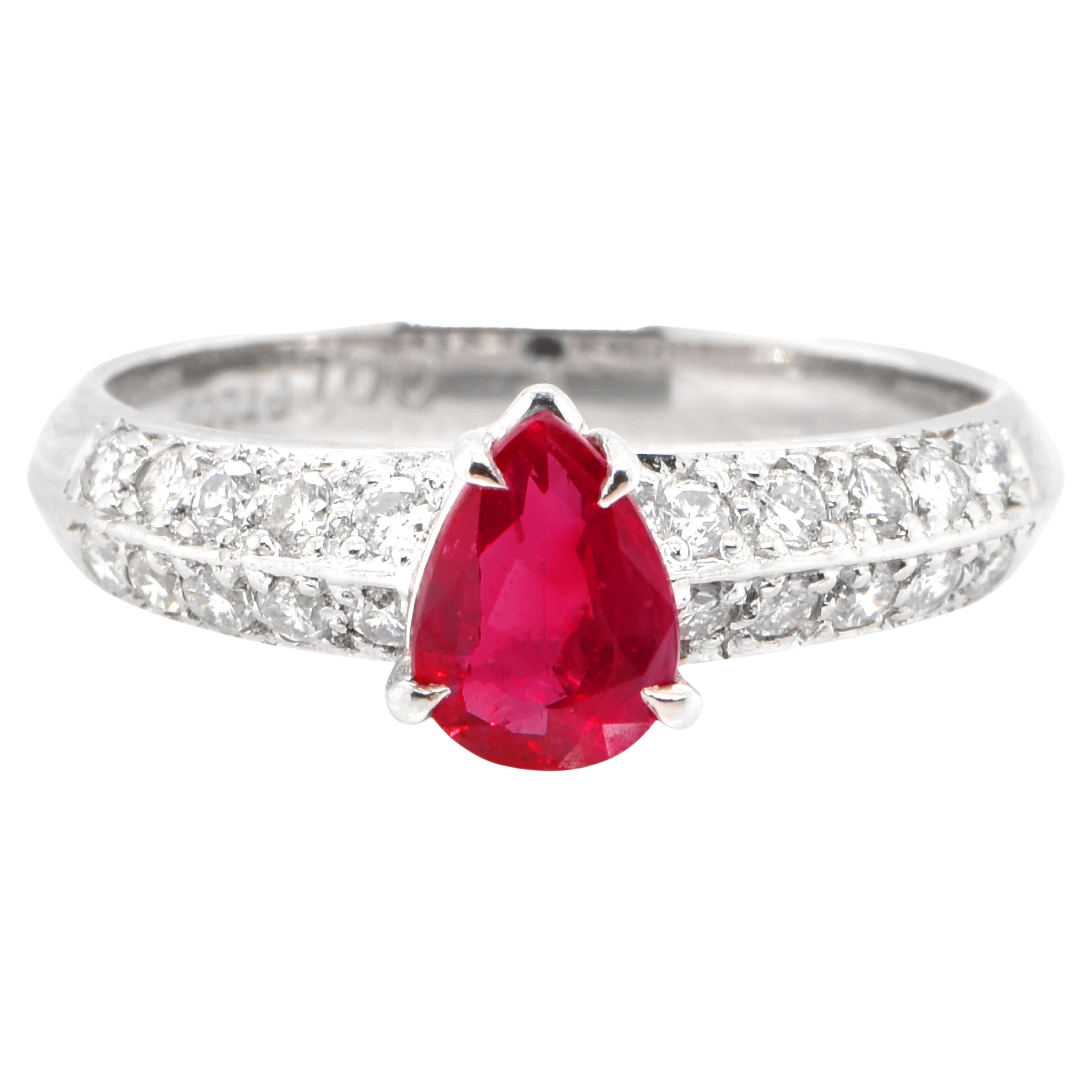 1.00 Carat Natural Pear Cut Ruby and Diamond Ring Set in Platinum For Sale