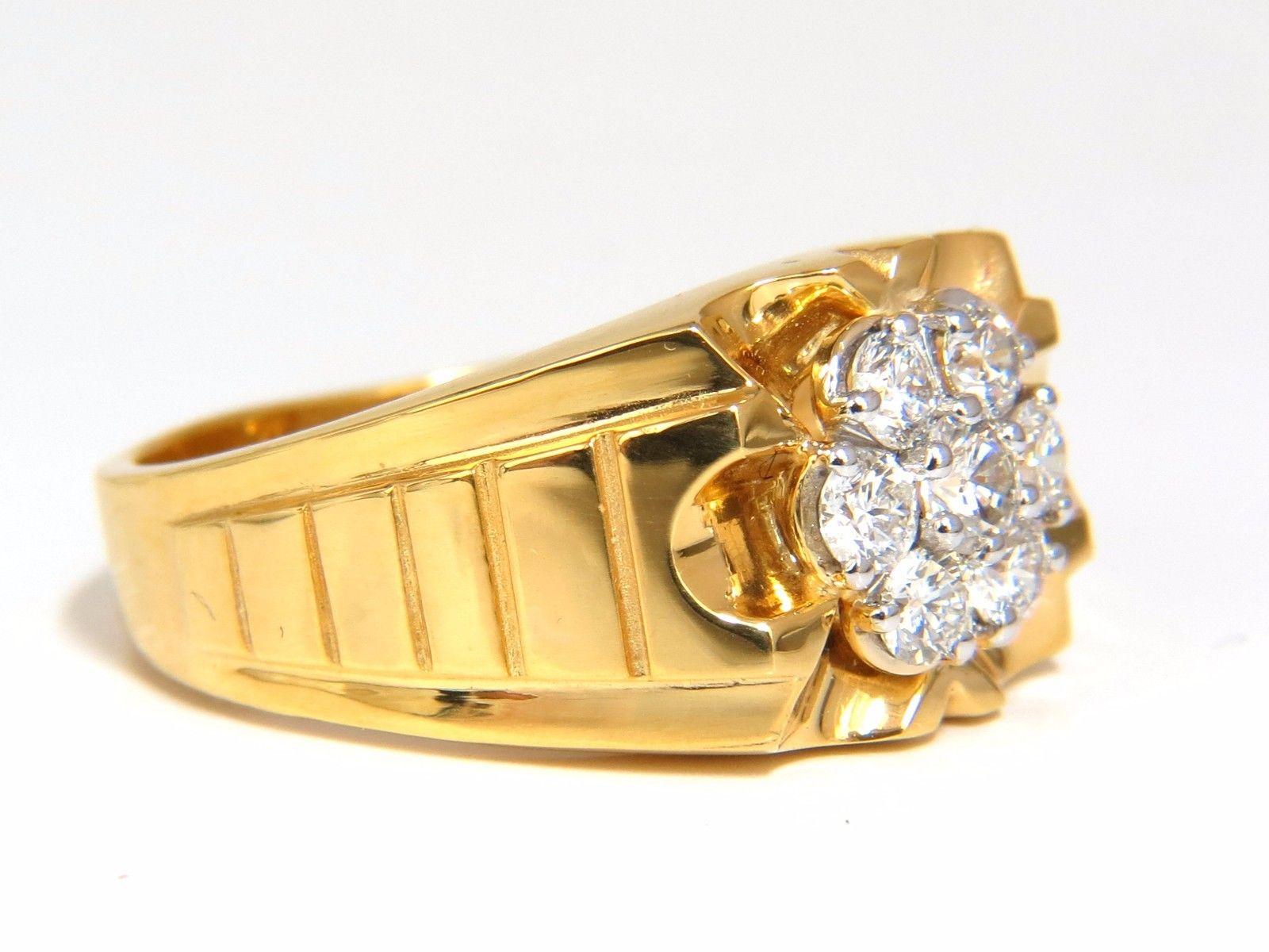 Men's Round cut diamonds wide band.

1.00ct. natural rounds cuts, prong set.

Vs-2 clarity

G-color

Natural, Earth Mined.

18kt. yellow gold.

11.7 grams.

Ring is 12.5mm wide 

current ring size: 

11

We may resize, please inquire

$6000