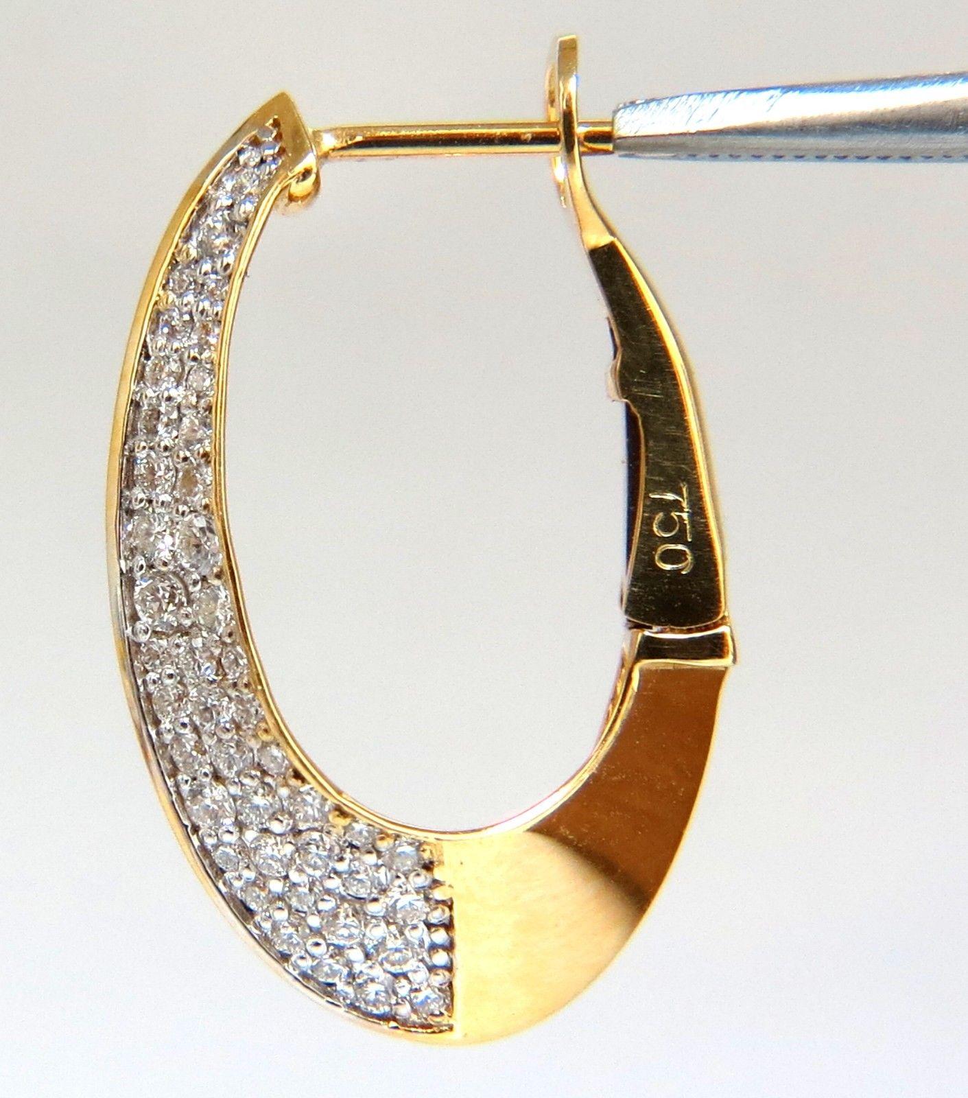 Elongated Hoop, Comfort Lever closure 

1.00ct. Natural diamonds  

Rounds, Full cut brilliants.

G- color Vs-2 Clarity. 

Excellent detail.

18kt. yellow gold

5.7 grams.

.61 inch wide

.96  inch long

$4500 Appraisal Certificate will accompany.