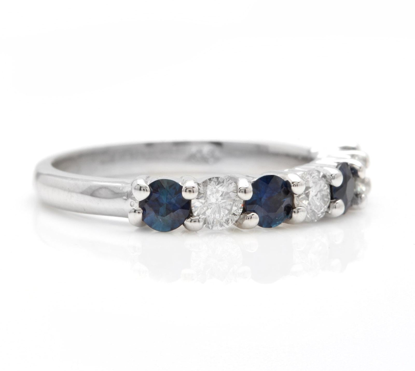 1.00 Carat Natural Sapphire and Diamond 14K Solid White Gold Ring

Suggested Replacement Value: Approx. $5,000.00

Total Natural Round Cut Sapphires Weight: Approx. 0.60 Carats 

Sapphire Treatment: Heat

Natural Round Diamonds Weight: Approx. 0.40