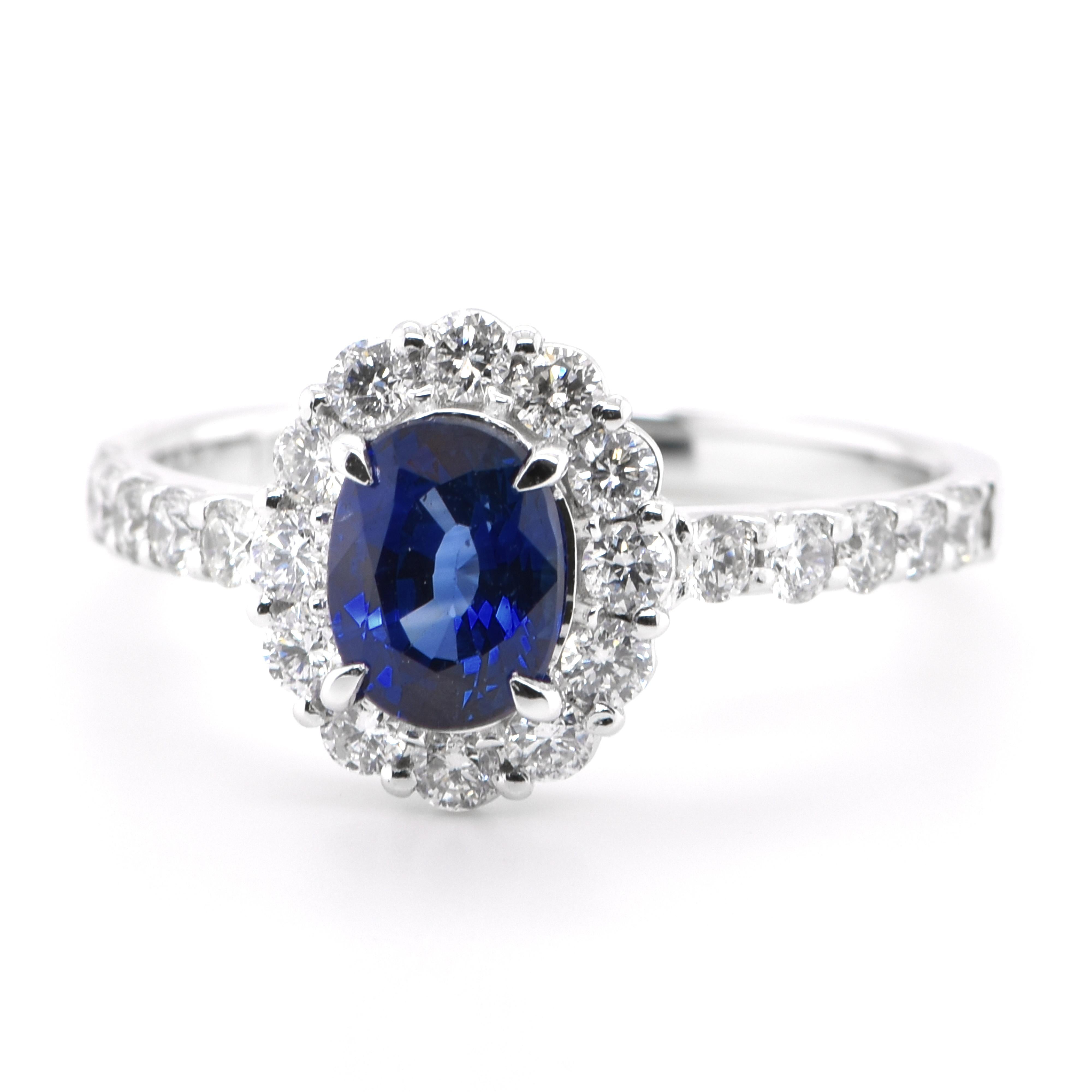 A beautiful Engagement Ring featuring a 1.00 Carat Natural Sapphire and 0.56 Carats Diamond Accents set in Platinum. Sapphires have extraordinary durability - they excel in hardness as well as toughness and durability making them very popular in