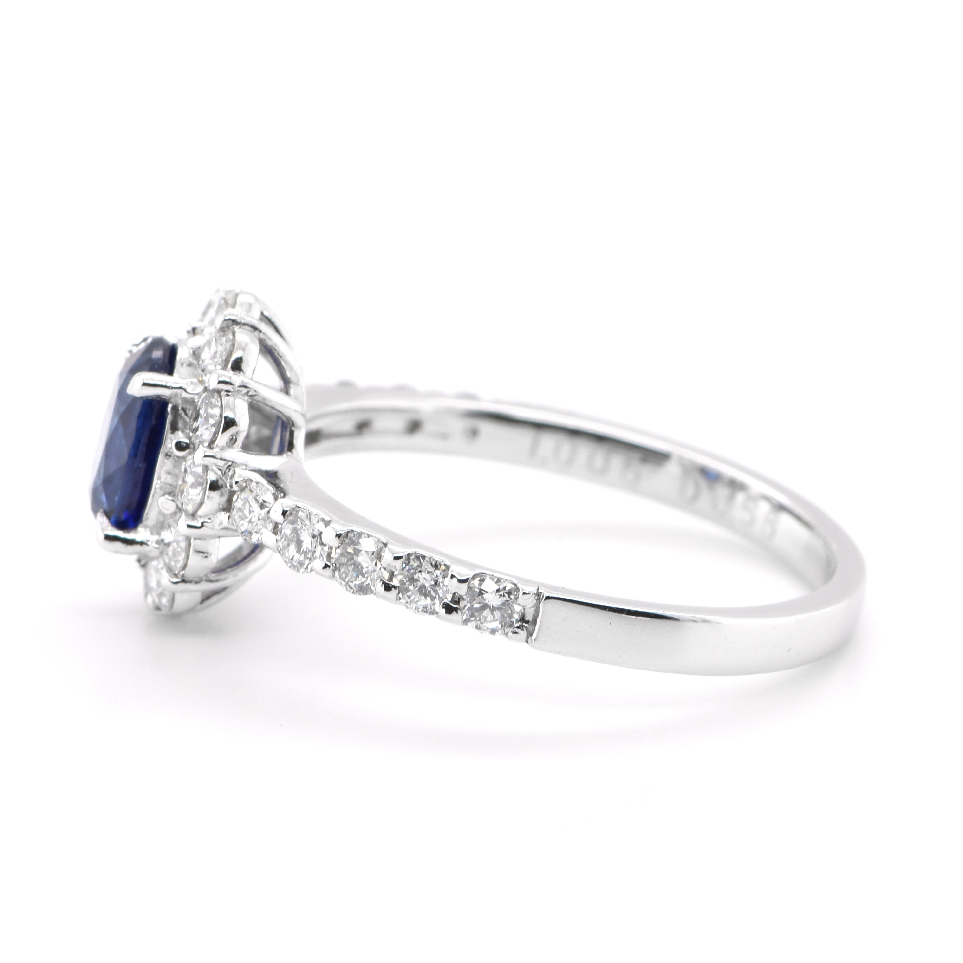 Oval Cut 1.00 Carat Natural Sapphire and Diamond Halo Ring Set in Platinum For Sale