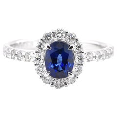 1.00 Carat Natural Sapphire and Diamond Halo Ring Set in Platinum