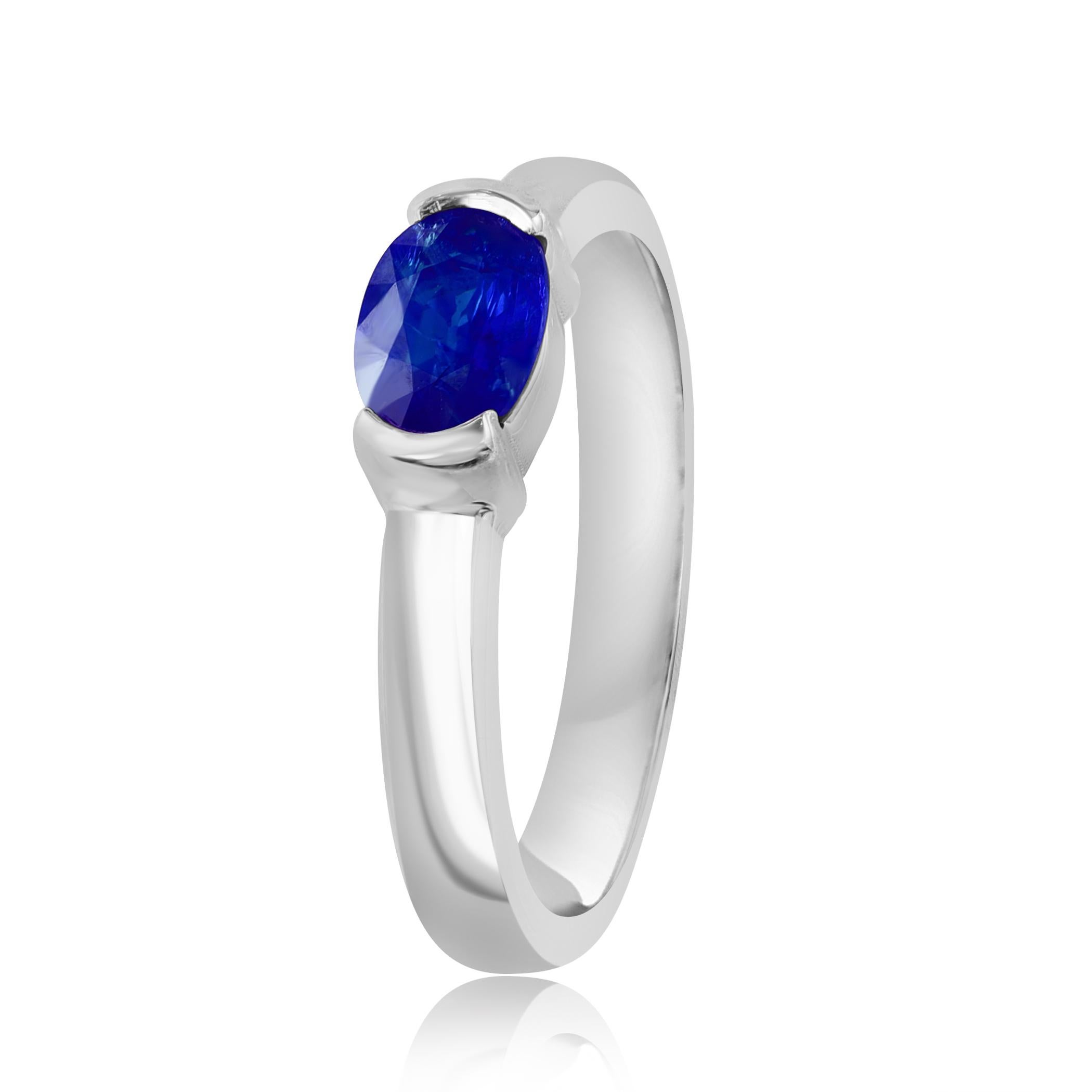 An elegant wedding band ring featuring an astonishing 1.00 Carat Oval Cut Blue Sapphire, set in a beautiful wide 14K white gold band. 

Style is available in different price ranges. Prices are based on your selection. Don't hesitate to get in touch