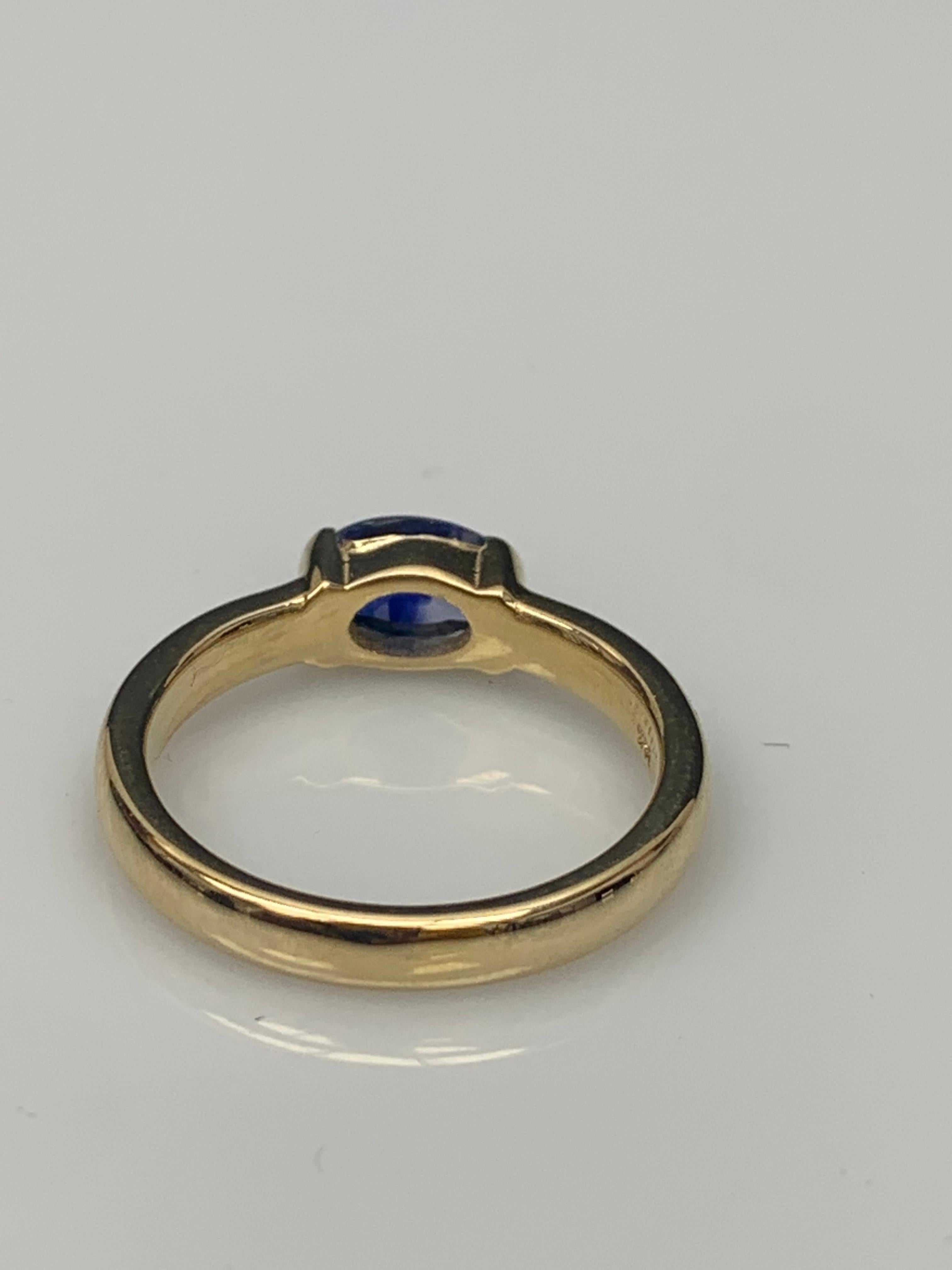 1.00 Carat Oval Cut Blue Sapphire Band Ring in 14K Yellow Gold For Sale 4