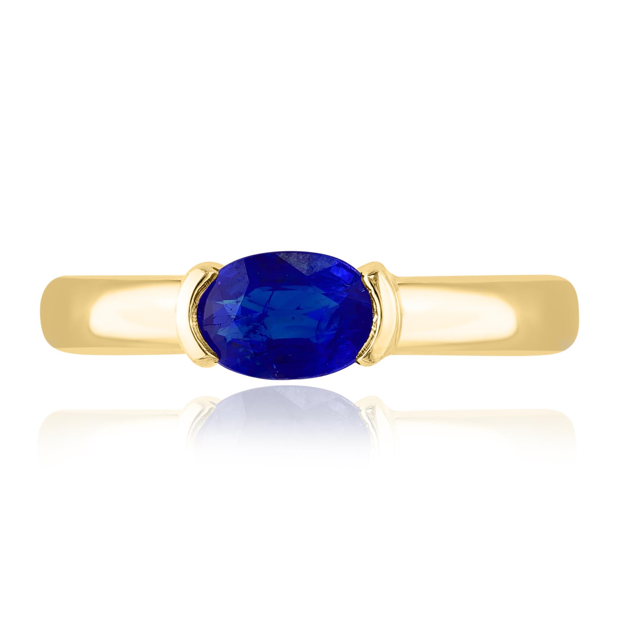 An elegant wedding band ring featuring an astonishing 1.00 Carat Oval Cut Blue Sapphire, set in a beautiful wide 14K yellow gold band. 

Style is available in different price ranges. Prices are based on your selection. Don't hesitate to get in touch