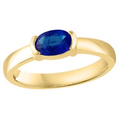 1.00 Carat Oval Cut Blue Sapphire Band Ring in 14K Yellow Gold