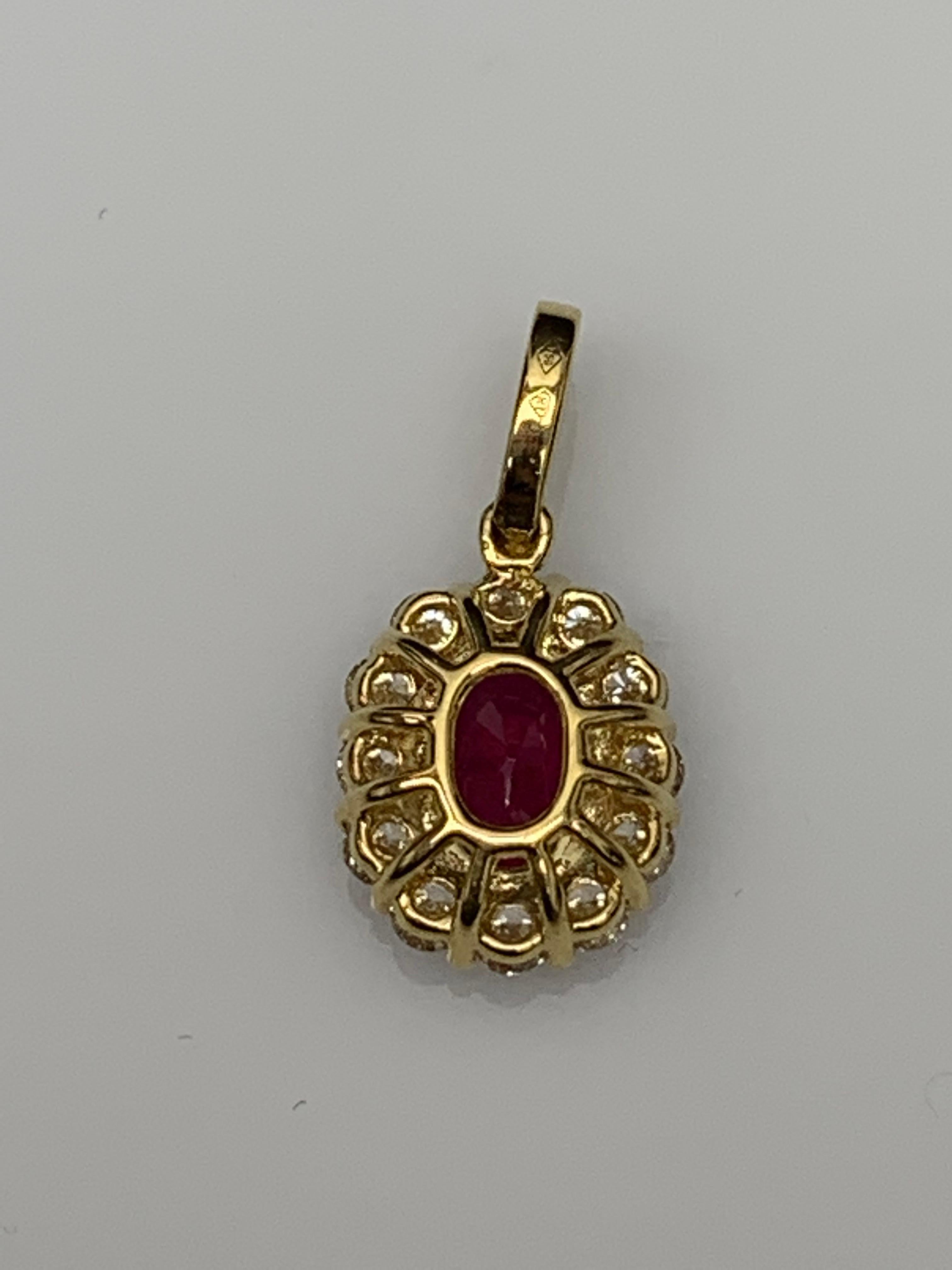 Women's 1.00 Carat Oval Cut Ruby and Diamond Halo Pendant Necklace in 18K Yellow Gold For Sale