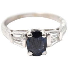 1.00 Carat Oval Cut Sapphire and Baguette Diamond 14 Karat White Gold Ring 1.00 Carat Oval Cut Sapphire and Baguette Diamond 14 Karat White Gold Ring
