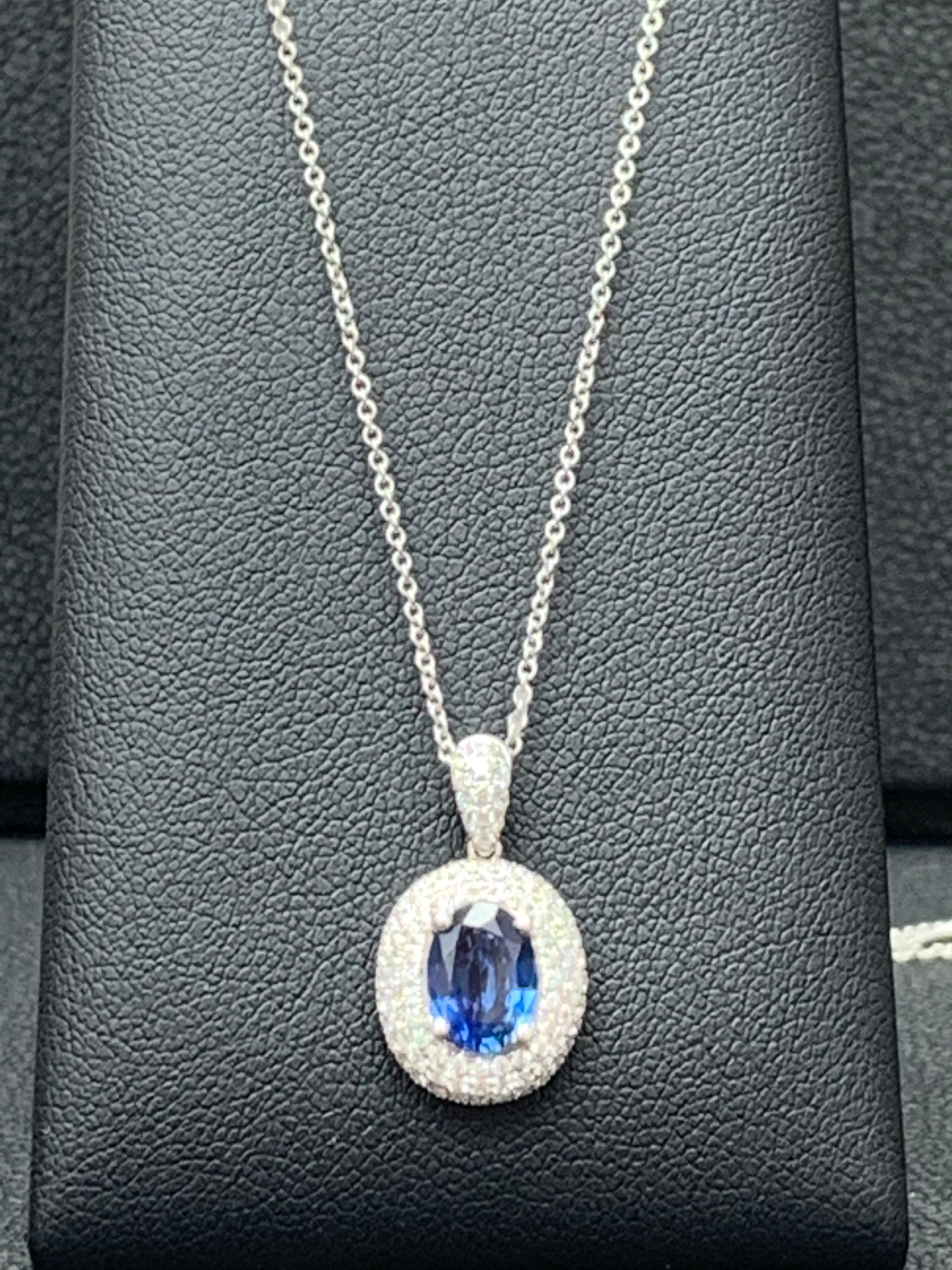 1.00 Carat Oval Cut Sapphire and Diamond Pendant in 18K White Gold For Sale 3