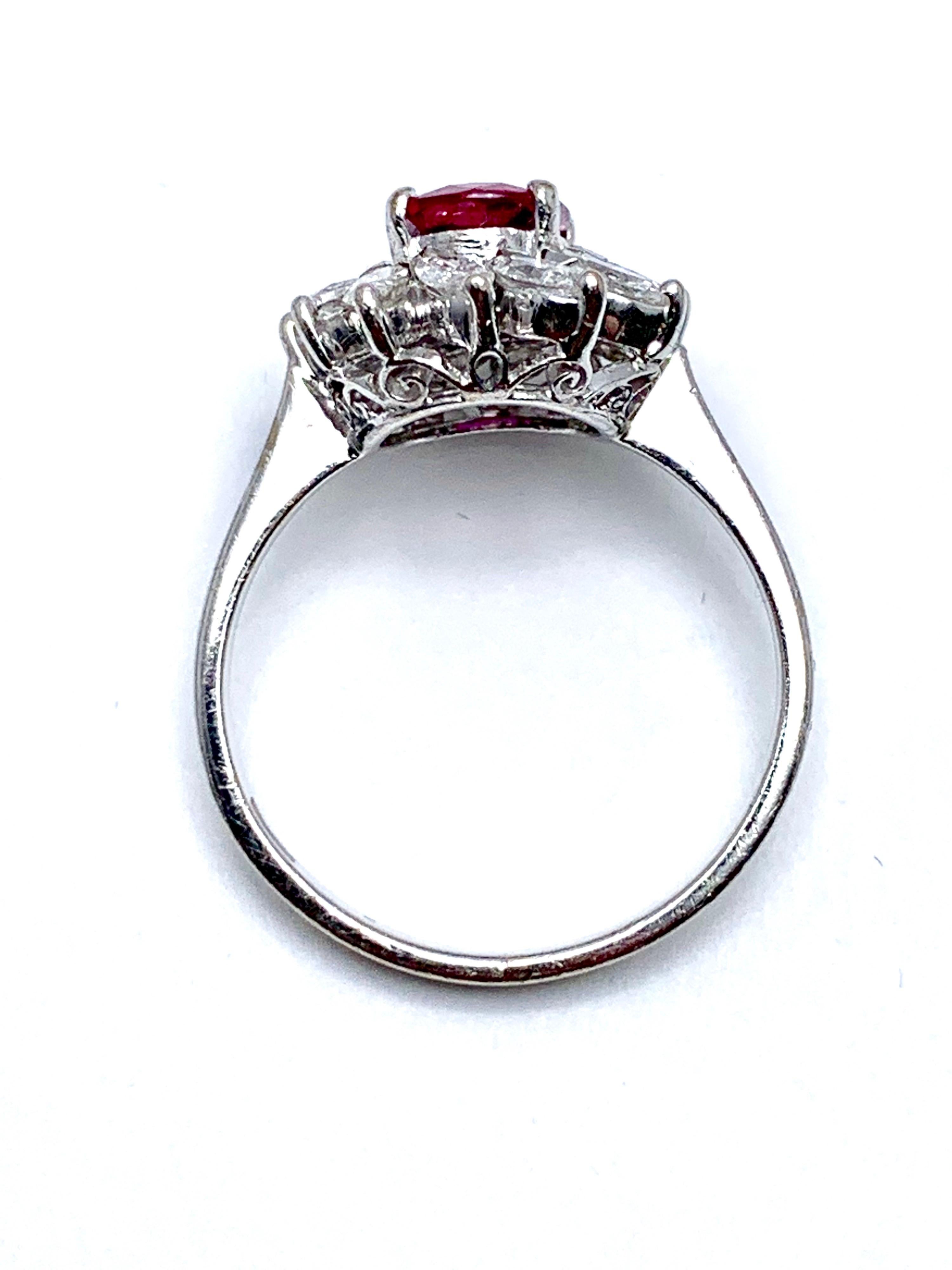 Retro 1.00 Carat Oval Ruby and Marquise Diamond Halo White Gold Ring For Sale