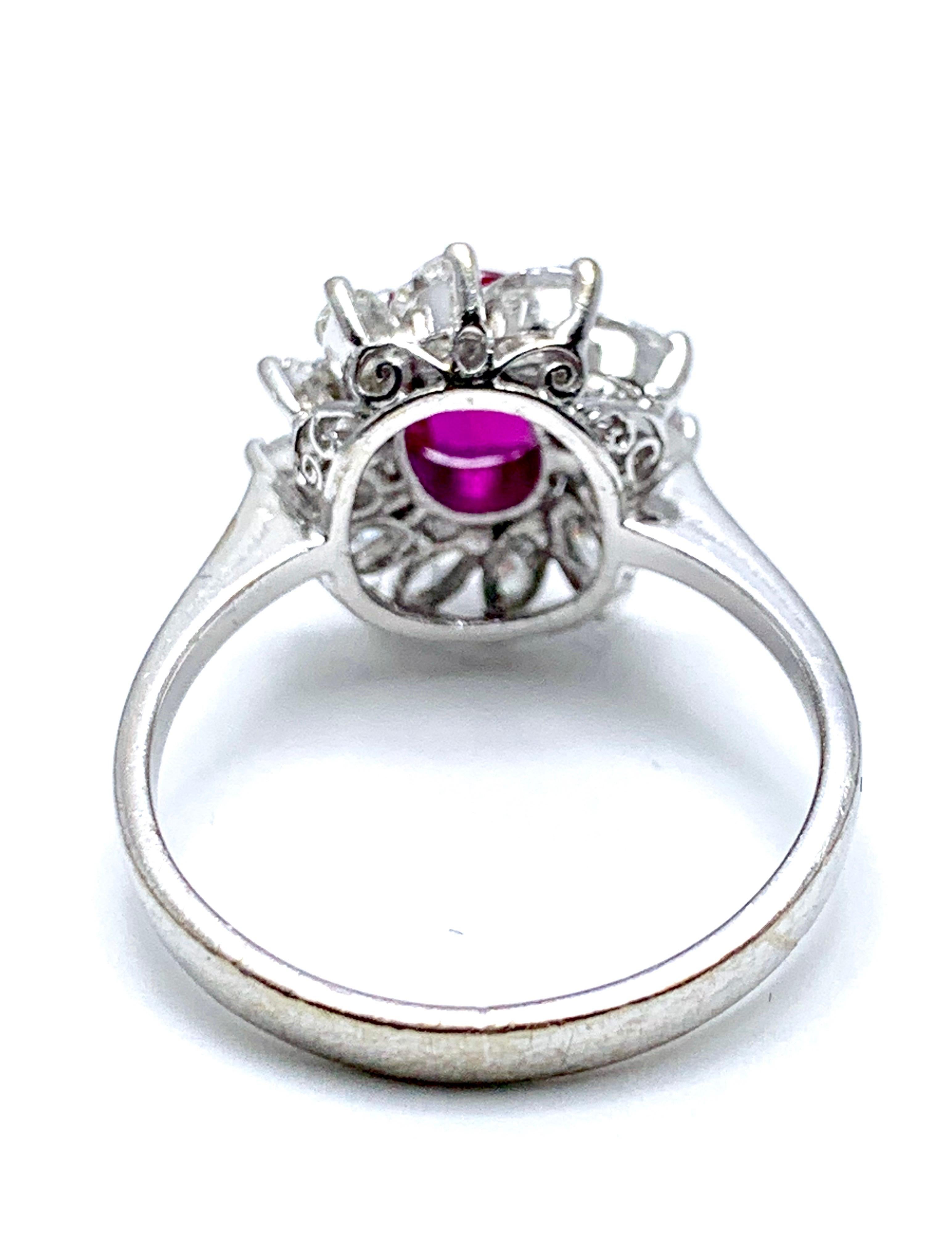 Marquise Cut 1.00 Carat Oval Ruby and Marquise Diamond Halo White Gold Ring For Sale