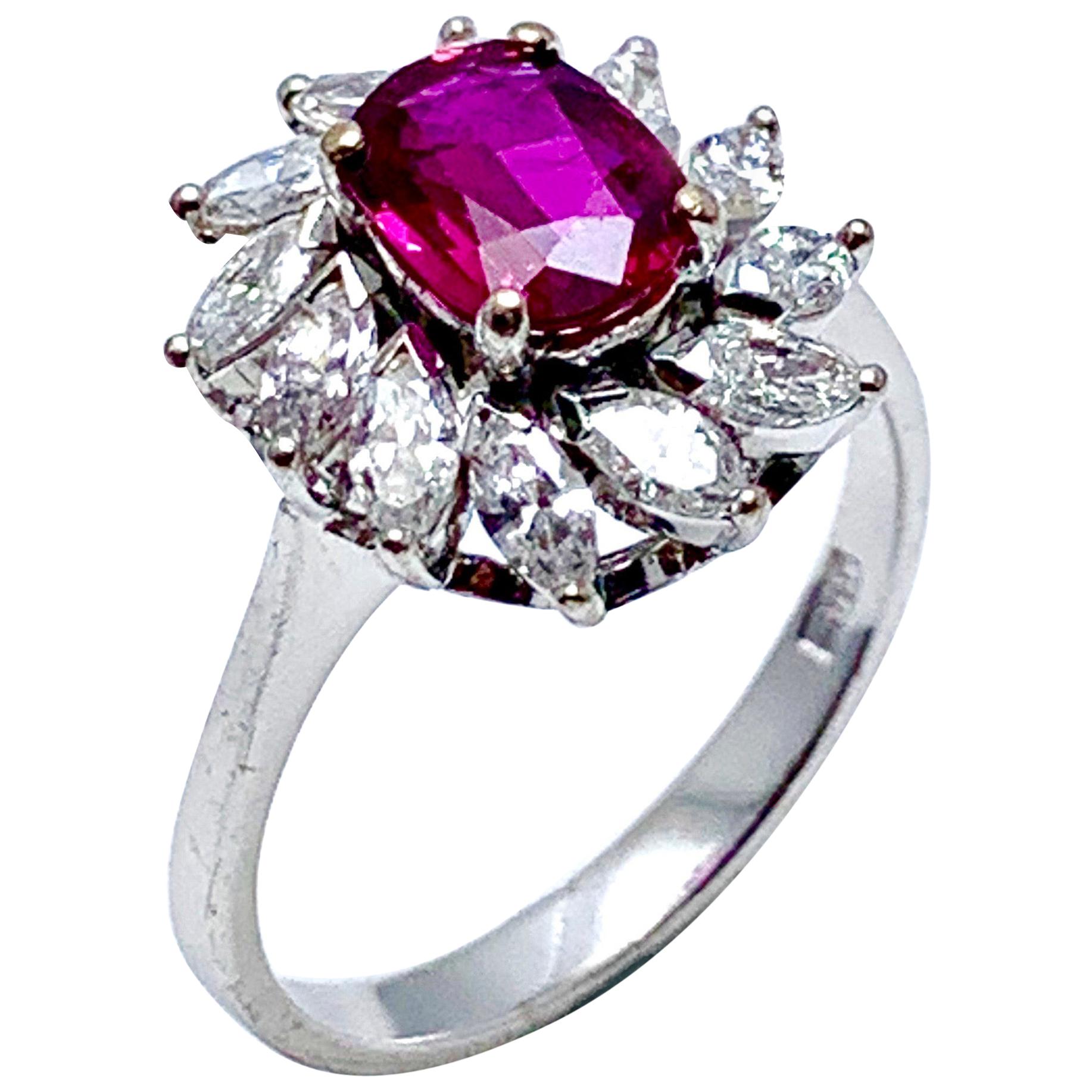 1.00 Carat Oval Ruby and Marquise Diamond Halo White Gold Ring For Sale