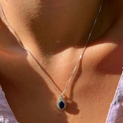 1.00 Carat Oval Sapphire and 0.70 Carat Diamond Necklace in 14K White Gold