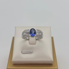 1.00 Carat Oval Tanzanite and Baguette Diamond Statement Ring 18K White Gold