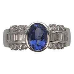 1.00 Carat Oval Tanzanite and Baguette Diamond Statement Ring 18K White Gold