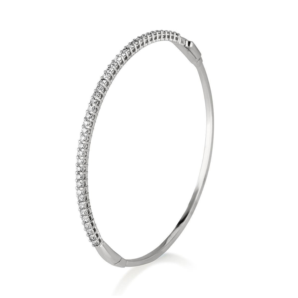 1.00 Carat Pave Diamond Bangle Bracelet in 14 Karat White Gold - Shlomit Rogel

Glamorous sparkle meets a classic design in this beautifully elegant bangle bracelet. Crafted from 14k solid white gold, the bracelet is pave set with 41 round genuine