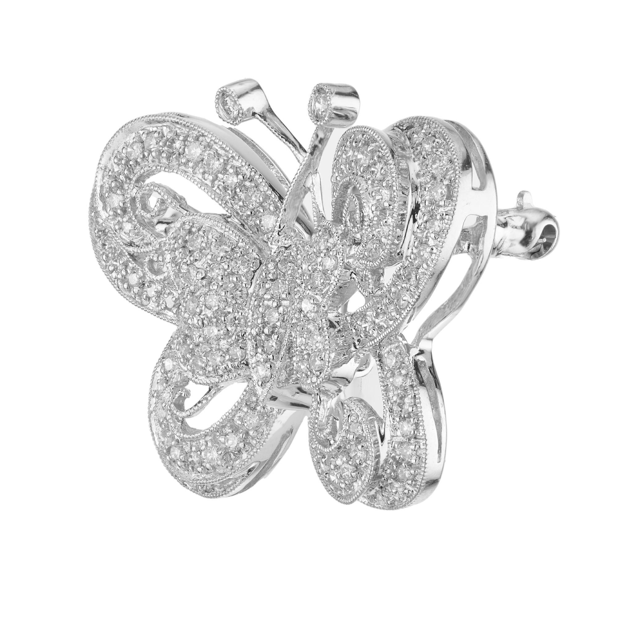1960's diamond butterfly brooch. Set with 123 round pave set diamonds with a total carat weight of 1.00cts. This exquisite piece is a dazzling flight of fancy, where each meticulously set diamond glimmers like dewdrops on butterfly wings. Crafted in