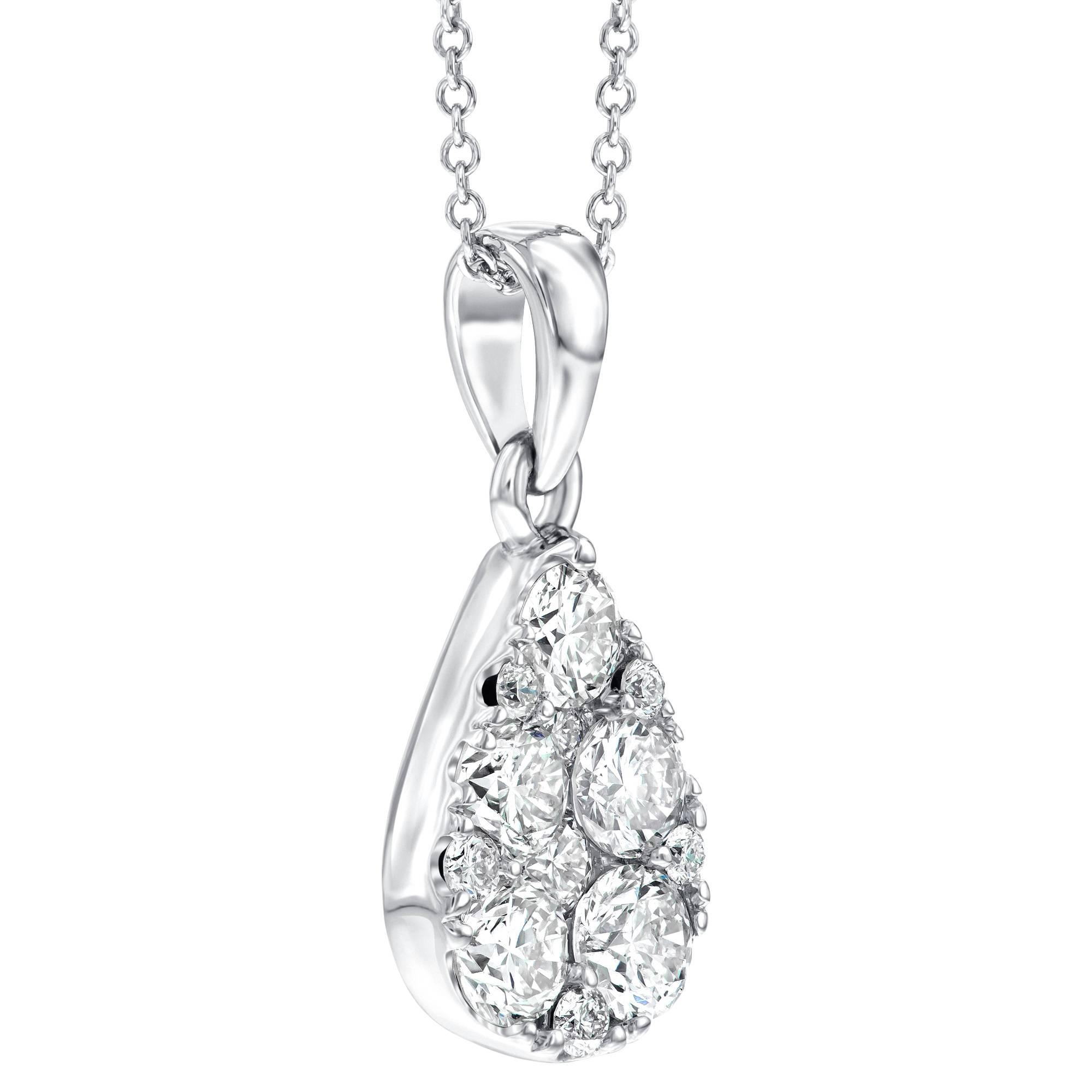 A gorgeous 1.00ct claw set pear shaped pendant, inlaid with various size diamonds this pendant has a unique studded finish that really captures the light. Set in 18ct White Gold which enhances the brilliance of the H-SI white diamonds. This pendant