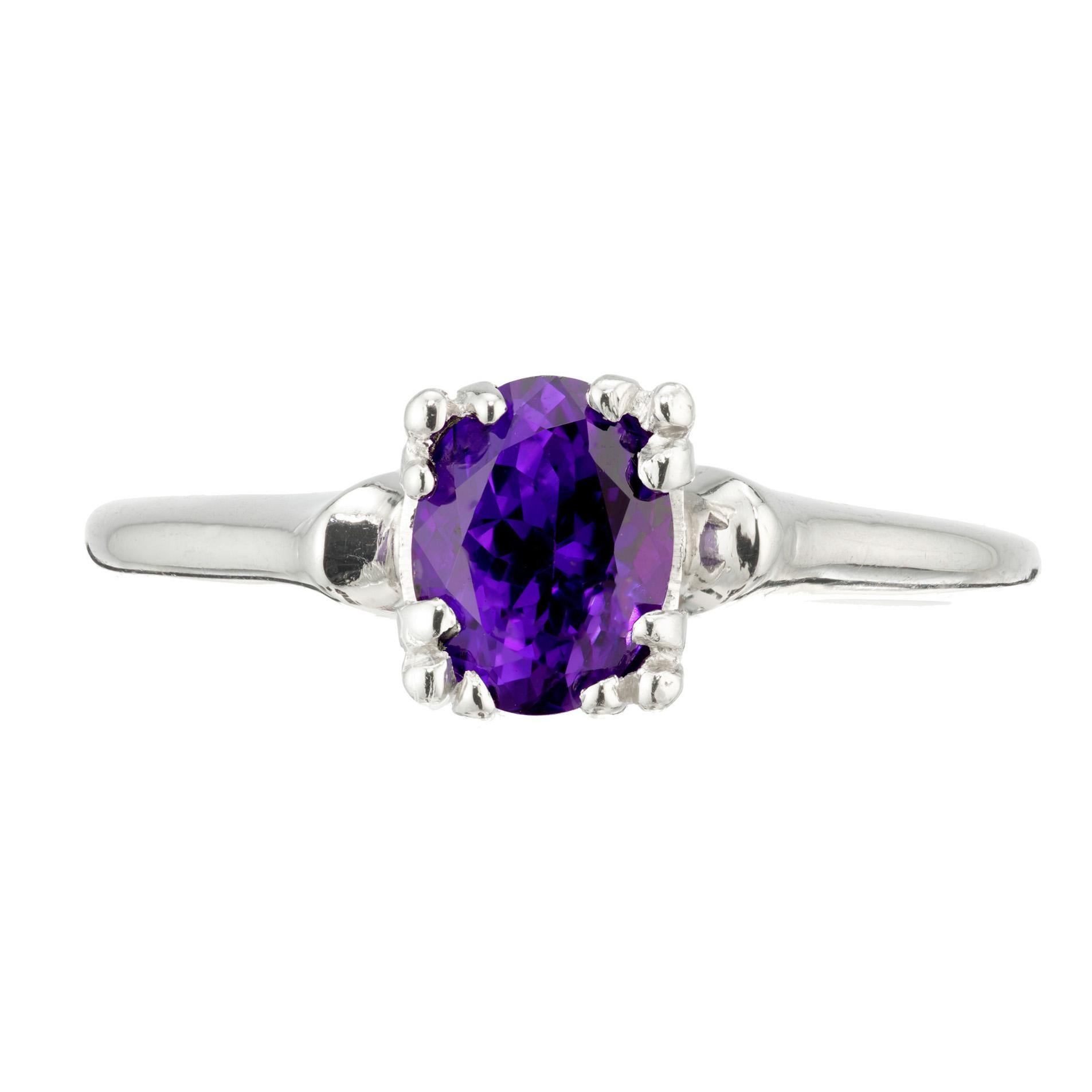 1930's late Art Deco sapphire engagement ring. AGL certified center purple oval sapphire set in a simple platinum setting. The sapphire is AGL certified bright purple no heat and no enhancements.

AGL certified #GB109163 natural no heat and no