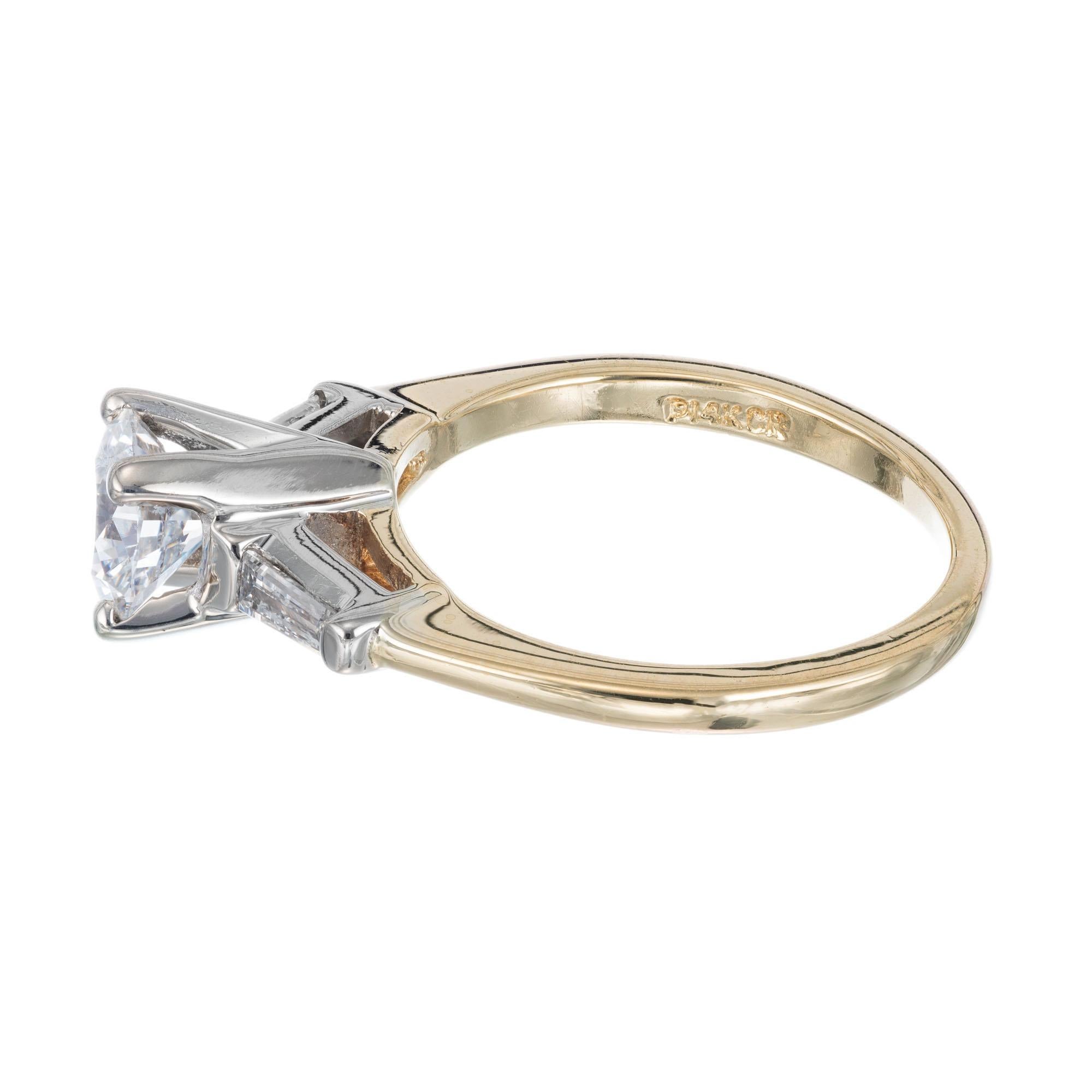 round cut diamond ring with baguettes