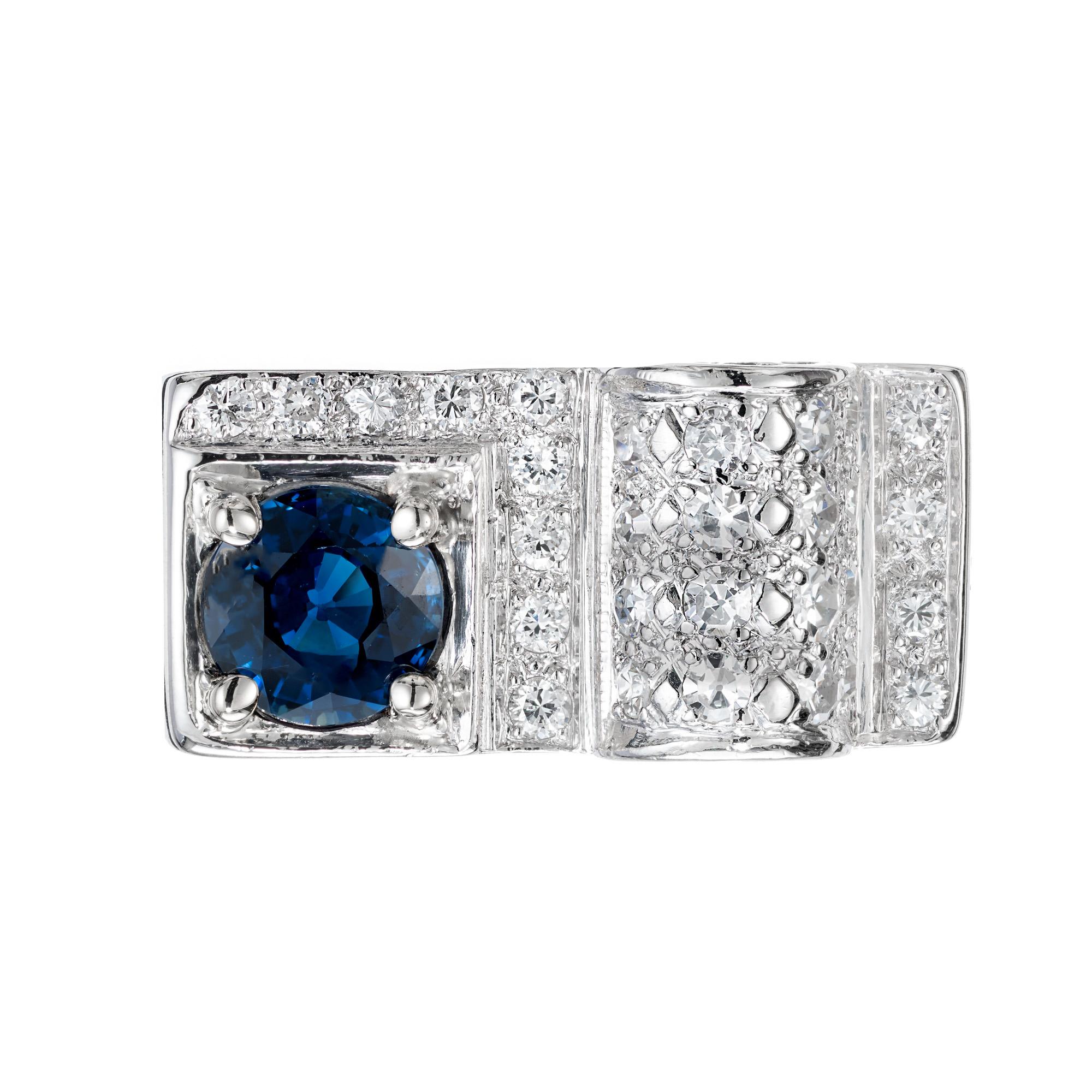  1940’s late Art Deco sapphire and diamond ring. 1.00 round sapphire gemstone, set in a platinum handmade setting with 29 pave set diamonds. This truly unique ring  has a flat top with a raised domed section all pave set diamonds.

1 round sapphire