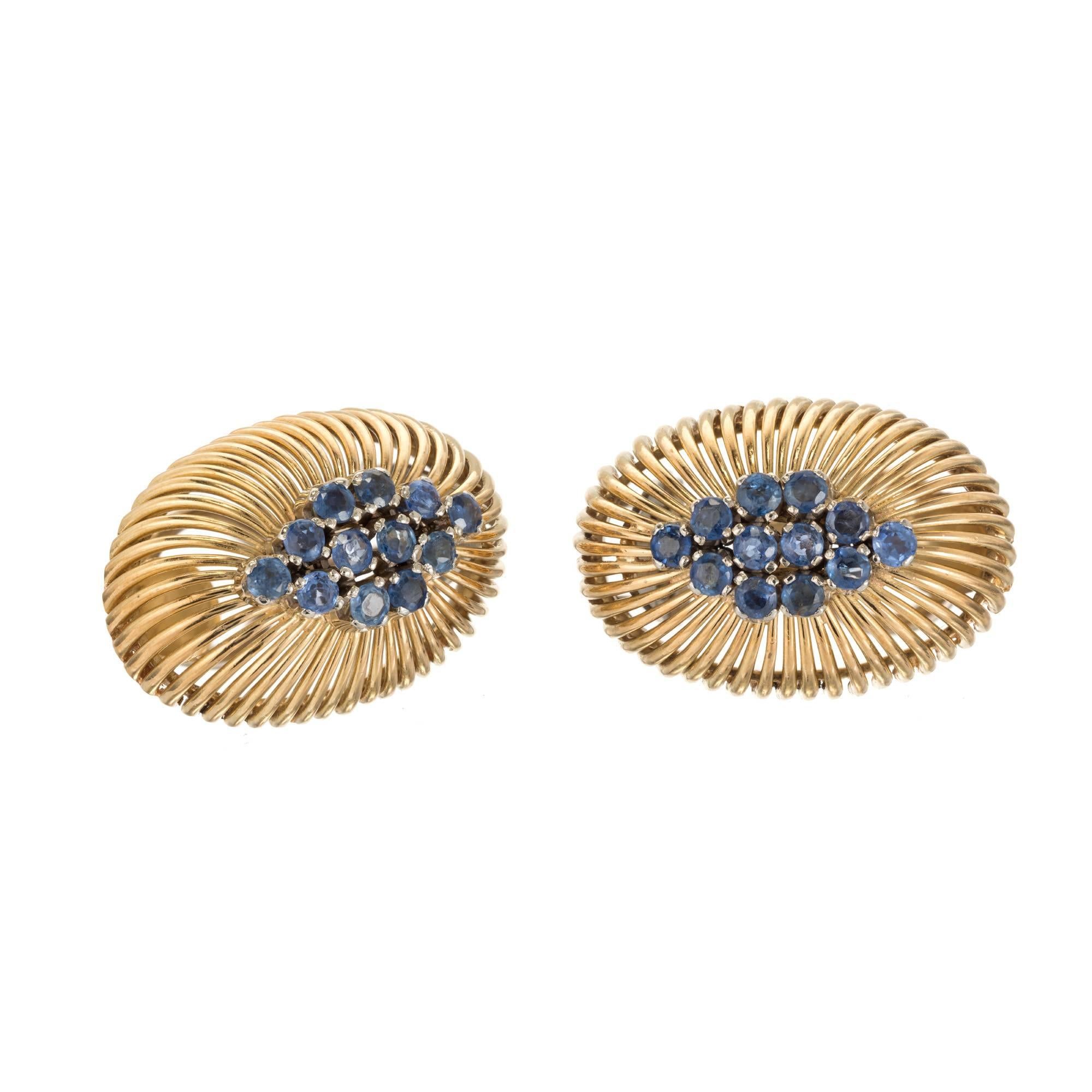 Handmade Italian clip post sapphire earrings in white and yellow 18k gold.

18k Yellow and white gold
24 round blue Sapphires, approx. total weight 1.00cts, SI1
Top to bottom: 23mm or .90 inch
Width: 15.77mm or .62 inch
Depth: 9.74mm
13.7