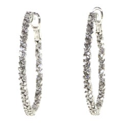 1.boucles d'oreilles avec diamants effilés de 00 carat en or blanc 18 carats