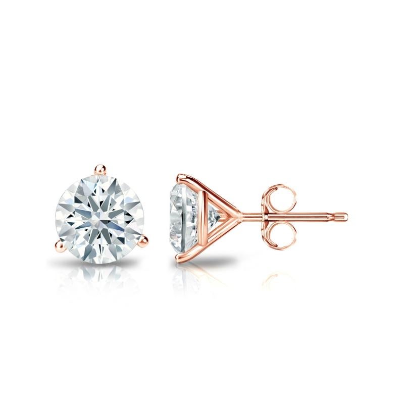 Stunning 14 Karat rose gold handmade earrings featuring 2 round brilliant cut diamonds weighing 1.00 carat total I-J color and SI clarity. These gorgeous earrings are classic and timelessly elegant.