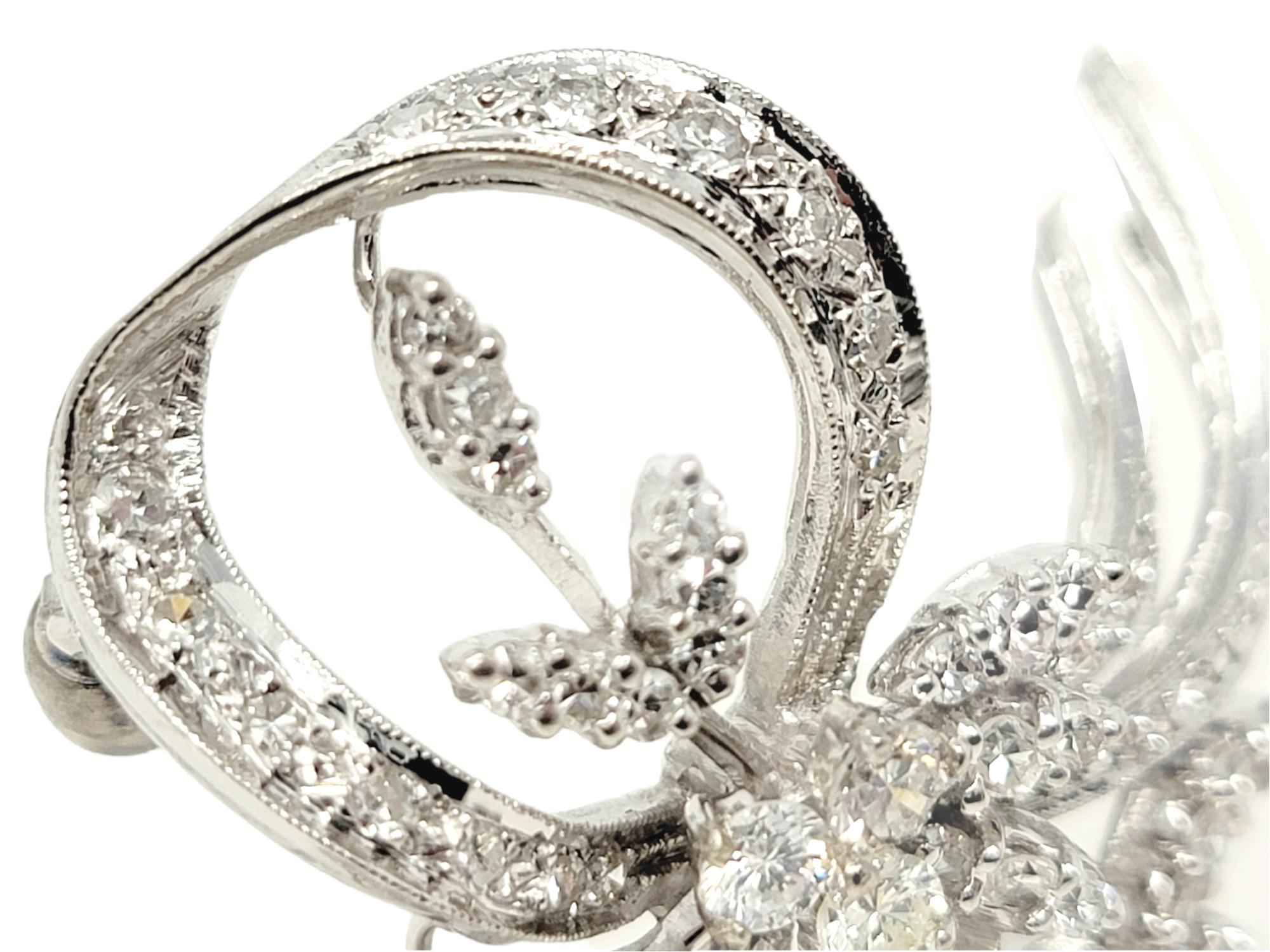 Contemporary 1.00 Carat Total Round Diamond Swirling Brooch in 14 Karat White Gold E-G / VS2