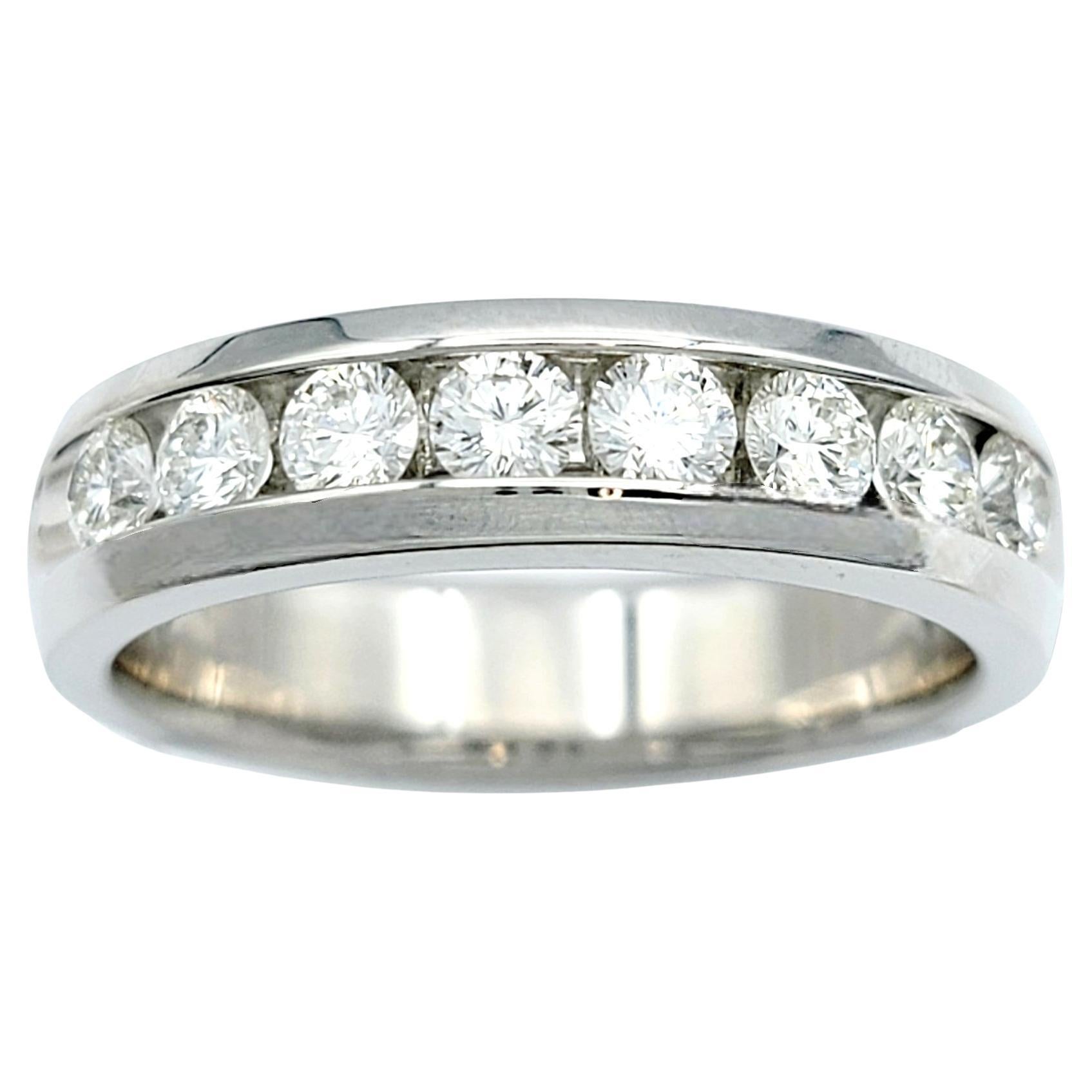 Ring Size: 10.25

This 'The Leo Diamond' band ring is a chic and elegant work of art. This diamond piece has a simple design, making it a sophisticated accessory suitable for both men and women. The band features a string of channel-set round