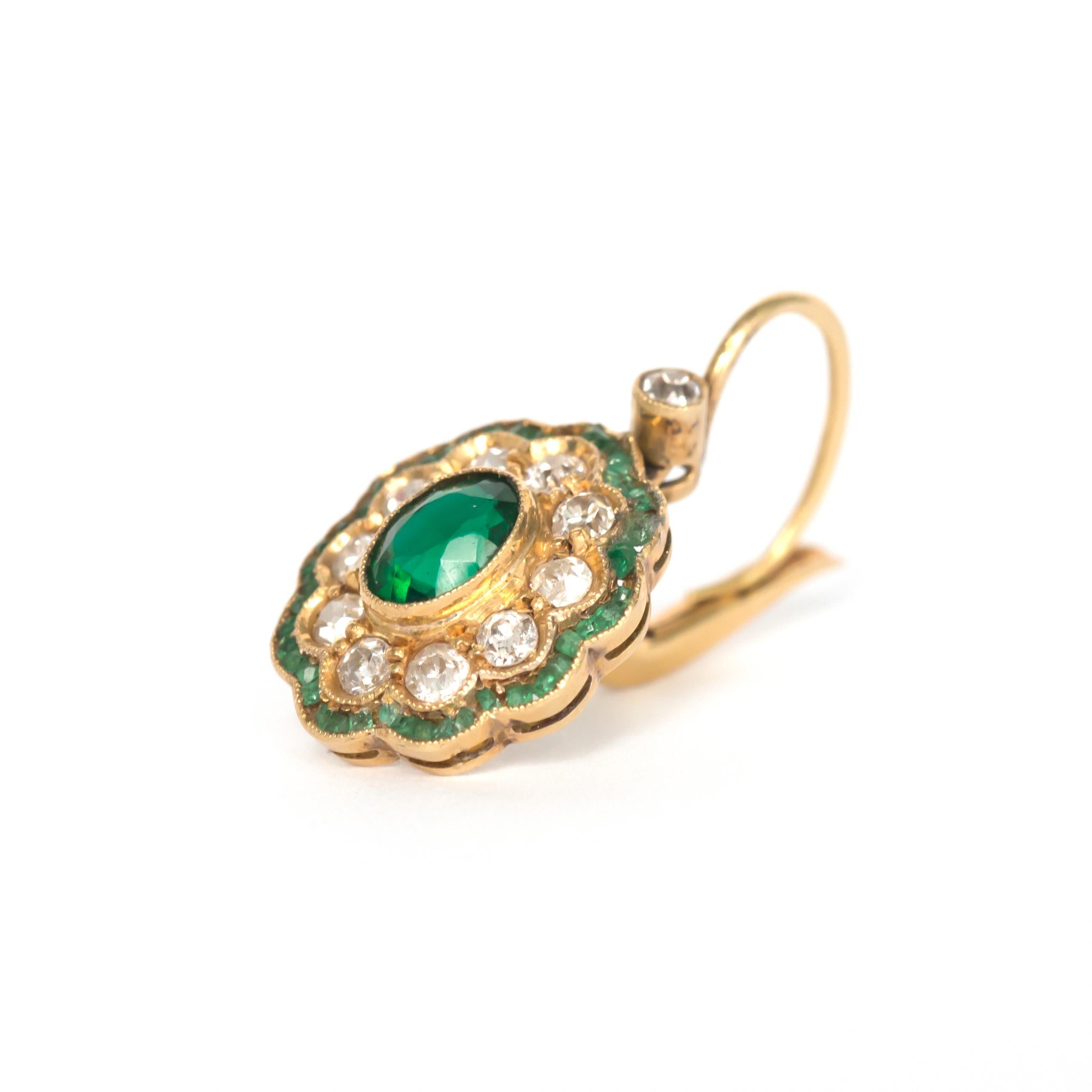 Metal Type: 14 karat Yellow Gold [Tested]
Weight:  3.6 grams

Center Stone Details:
Weight: 1.00 carat, total weight
Cut: Oval 
Color: Deep Green
Clarity: VS

Diamond Details: 
Weight: .50 carat, total weight
Cut: Old European Brilliant
Color: