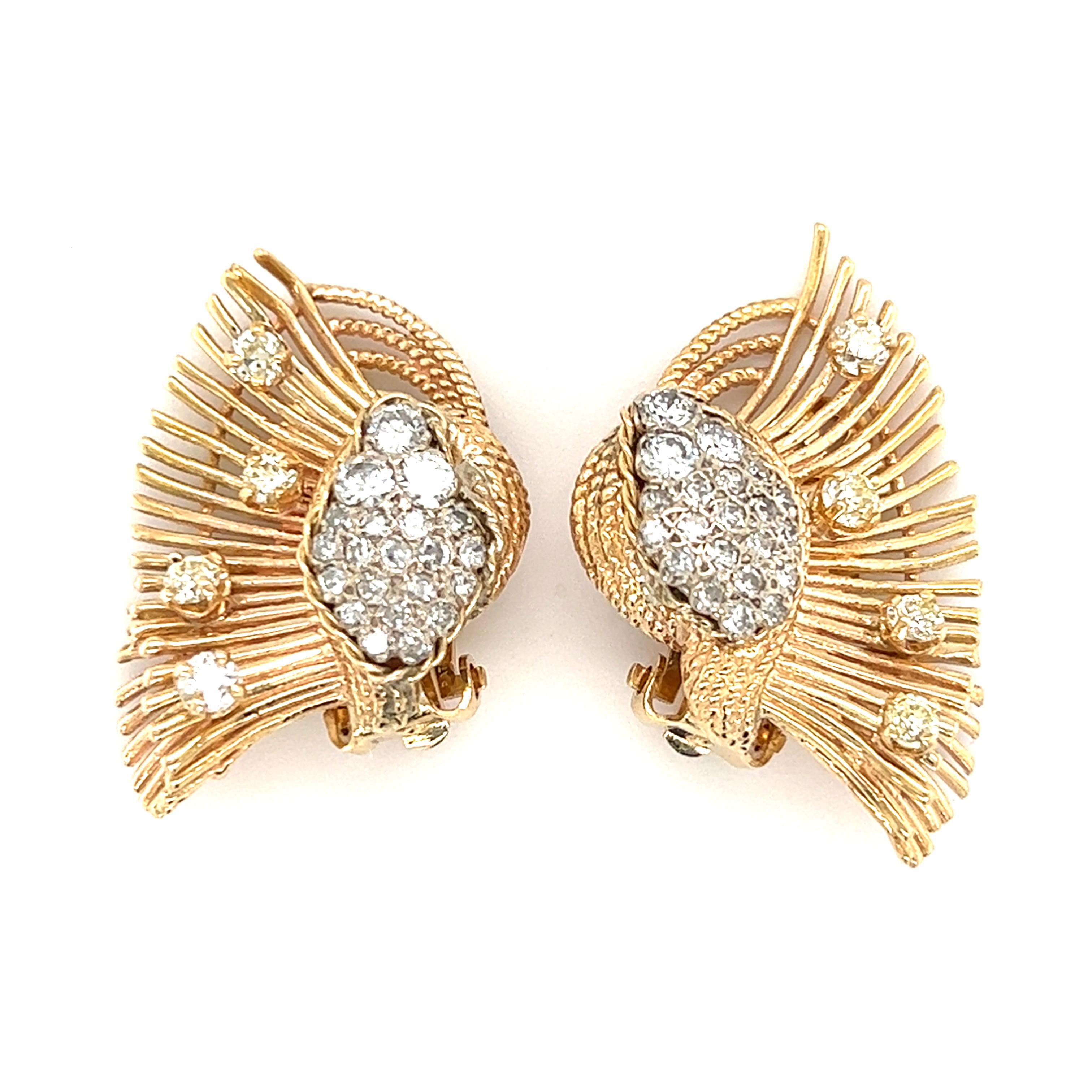 One pair of 14 karat yellow gold clip-on earrings set with forty-four (44) round brilliant cut diamonds, approximately 1.00-carat total weight with matching H/I color and SI1 clarity.  The earrings measure 1.25 inches long and 1 inch wide. 