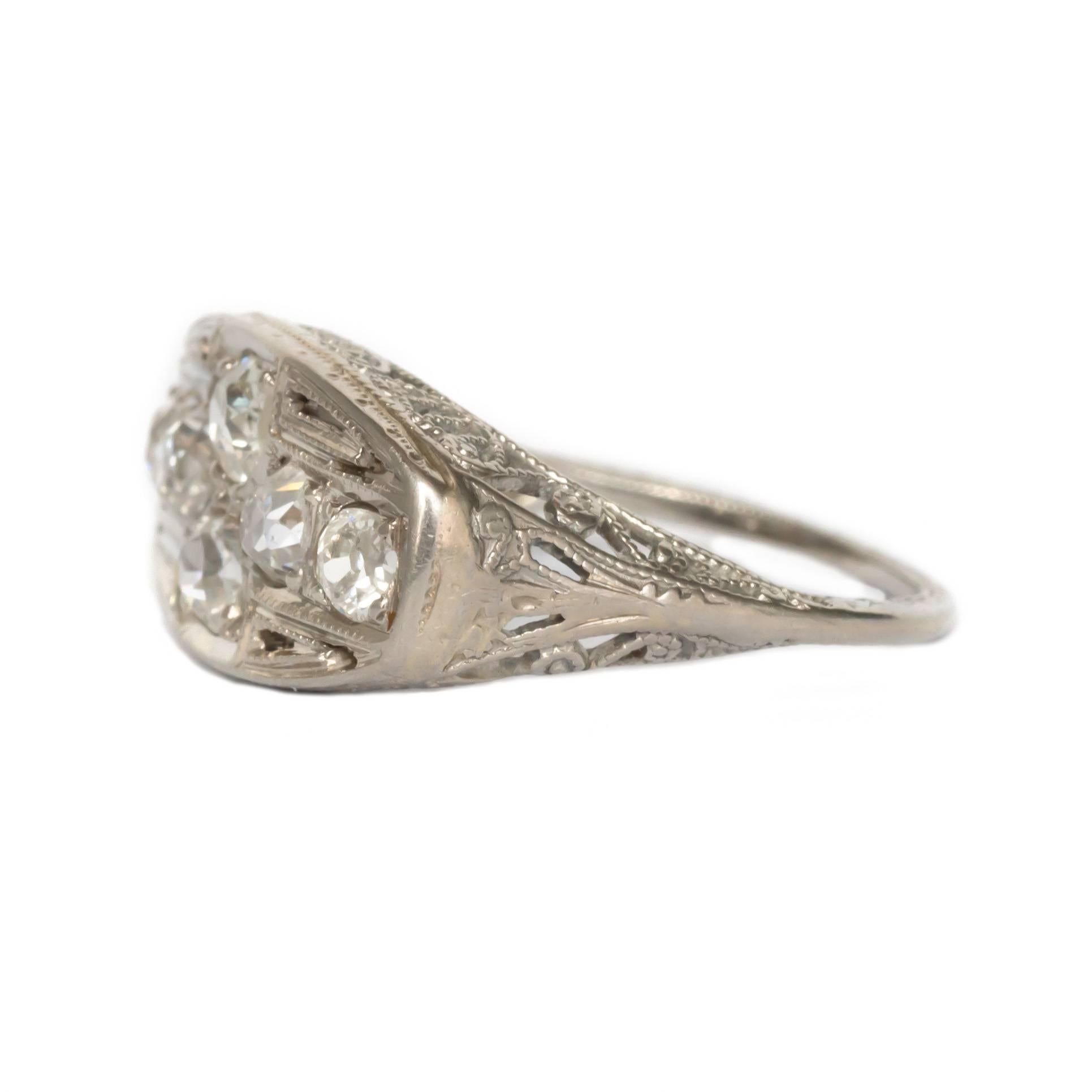 Item Details: 
Ring Size: 5.3
Metal Type: 18 Karat White Gold 
Weight: 3.4 grams

Side Stone Details: 
Shape: Old Mine Cushion
Total Carat Weight: 1.00 carat total weight
Color: I
Clarity: VS

Finger to Top of Stone Measurement: 5.04mm