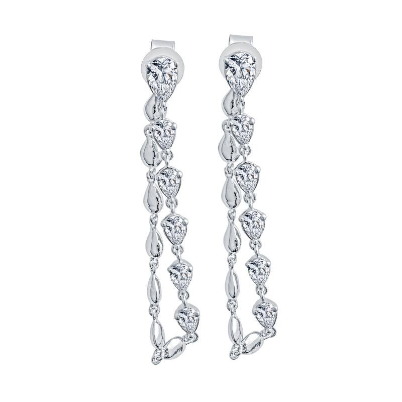 These elegant earrings showcase 1.00 carat total weight of pear-shaped natural diamonds that dangle into a hoop. They are set in opulent 14 karat white gold. A perfect accessory for adding a touch of sophistication to any outfit.
Measurements: