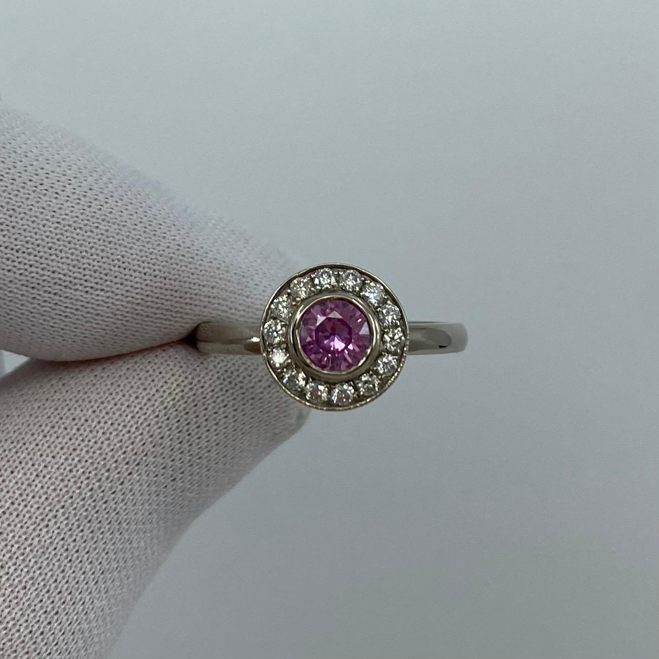 Round Cut 1.00 Carat Vivid Pink Sapphire and Diamond 18 Karat White Gold Halo Ring For Sale
